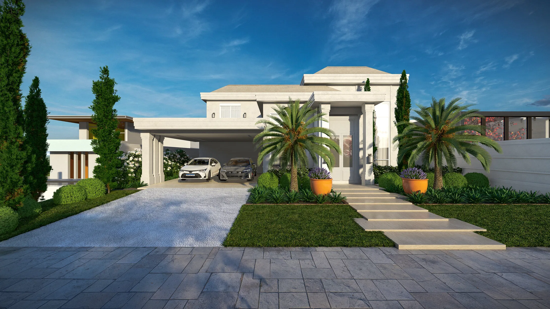 White neoclassical facade with a covered garage, palms, orange agapanthus planters, a stone stair and a paved forecourt
