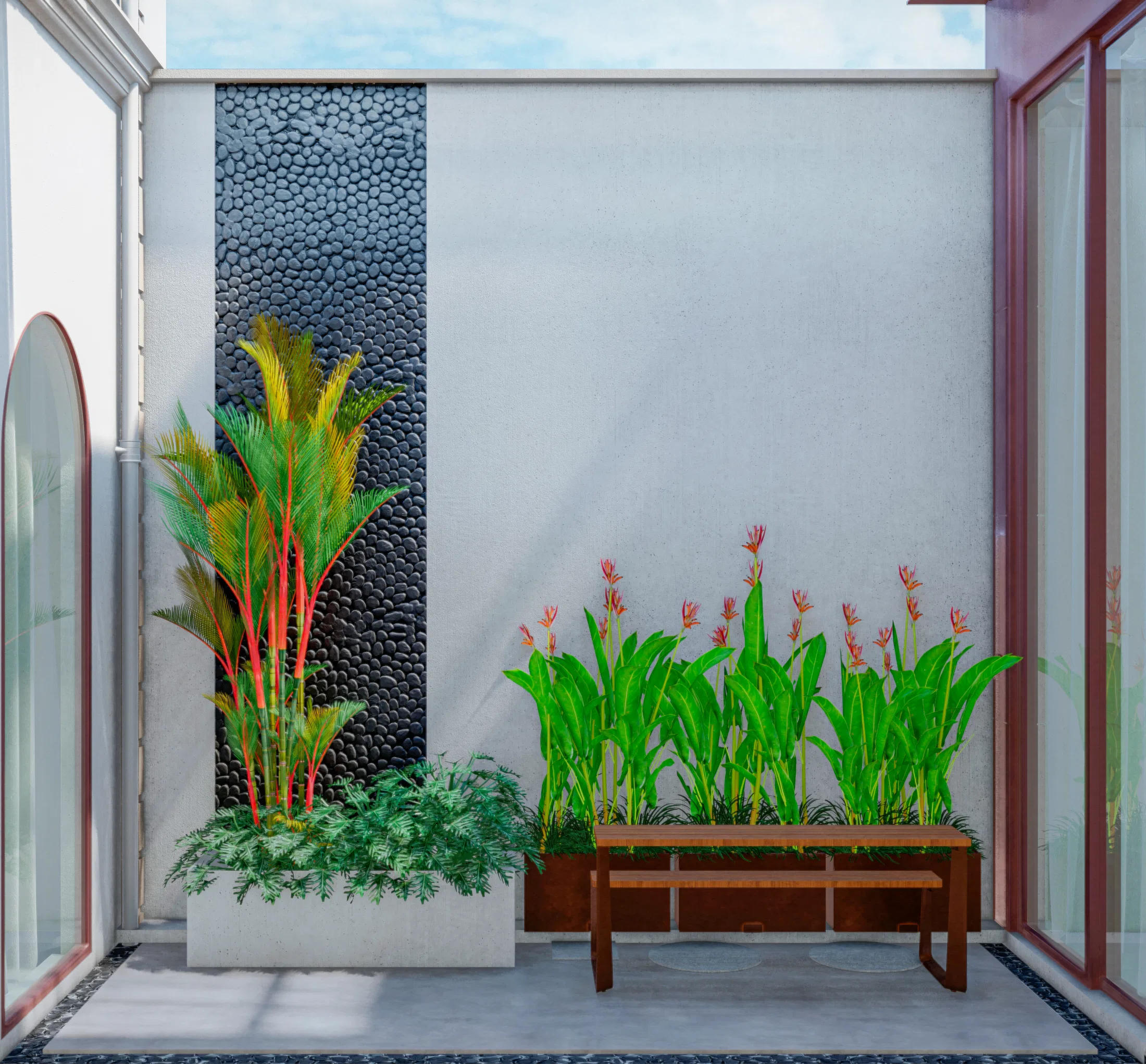 Pale courtyard wall open to the sky, with a black-pebble strip, a wooden bench and a row of flowering heliconias in a concrete planter