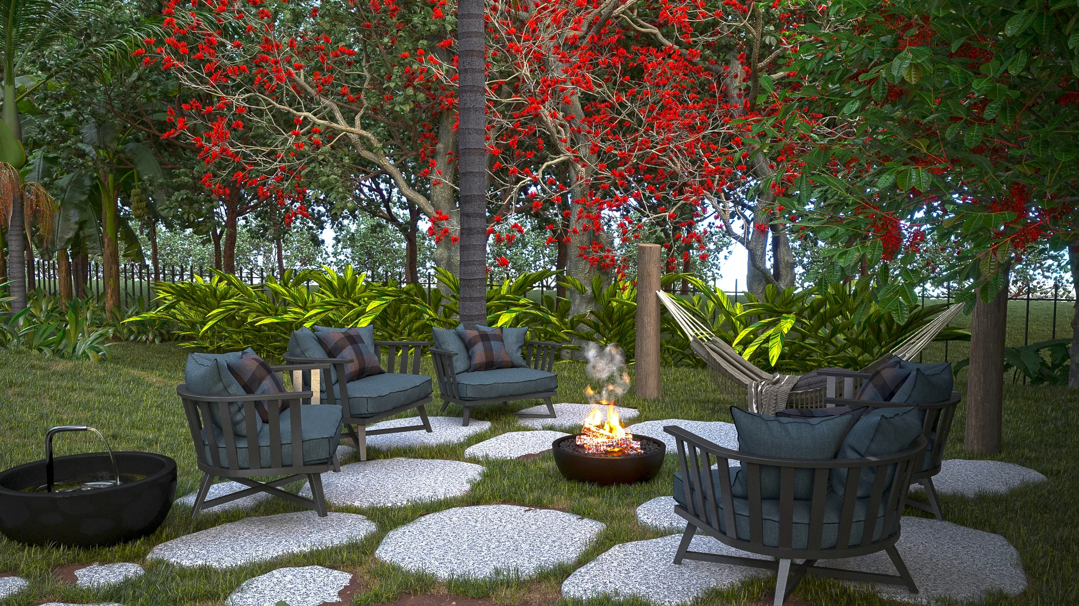 Outdoor lounge with plaid-cushioned armchairs around a lit fire bowl, a hammock and a fountain, under a red-flowering flame tree