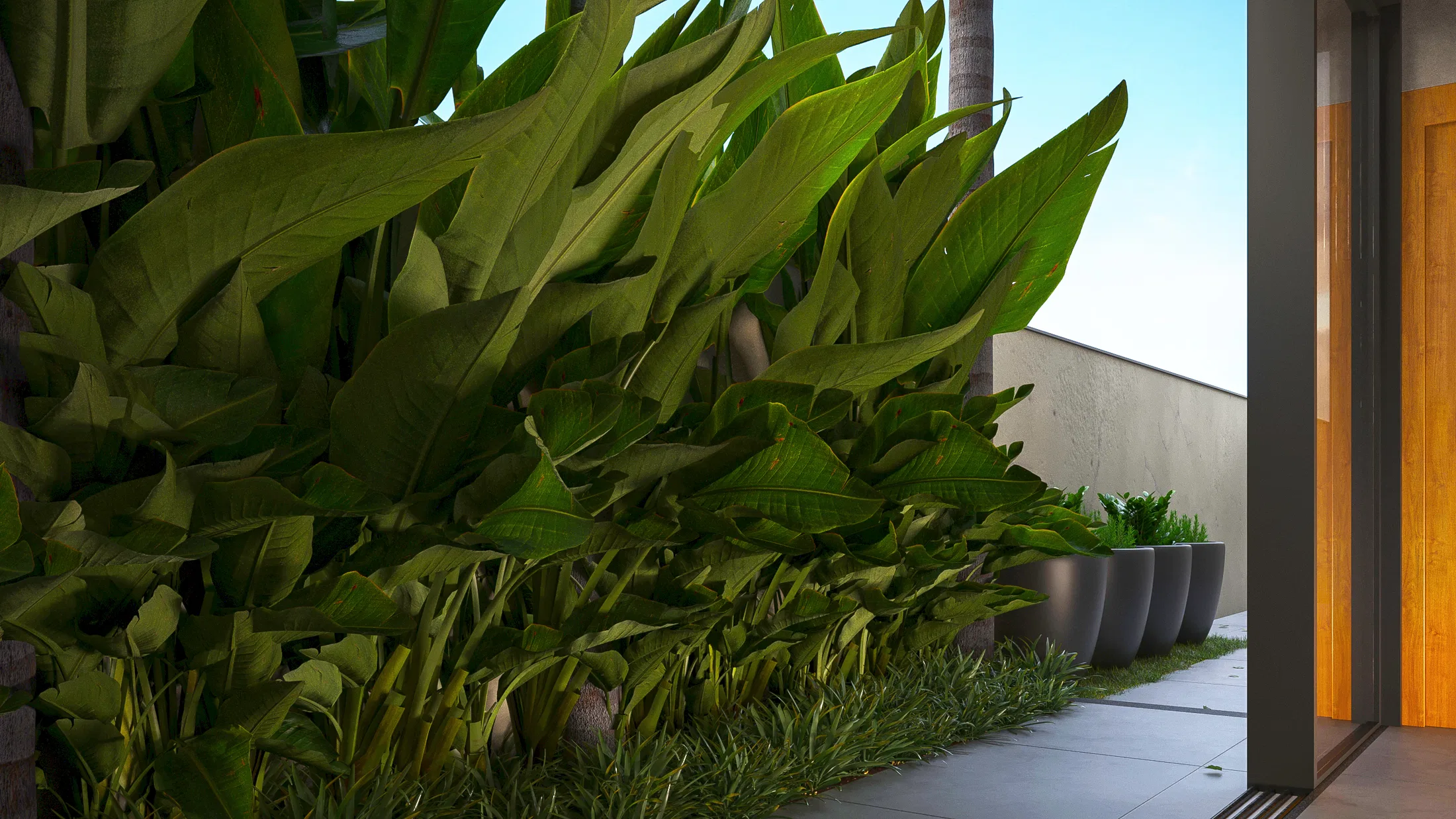 Side passage with a mass of broad-leaved tropical foliage, tapered planters holding ferns and a stone floor