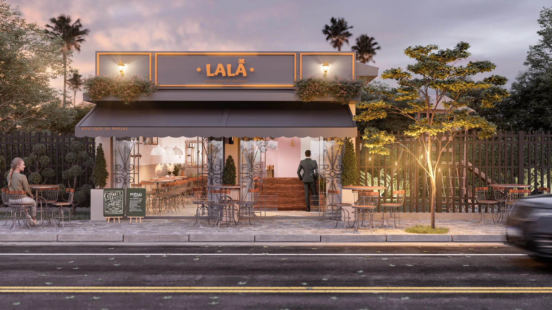 Lalá restaurant facade at dusk, with an illuminated sign, dark awning and a terrace of bistro tables beside the sidewalk