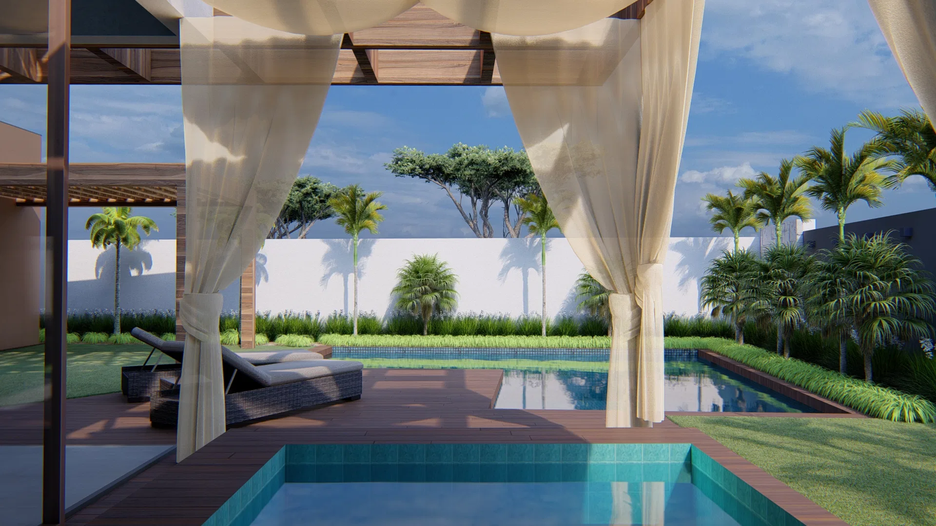 Pool deck seen beneath a white-fabric pergola, with a rattan chaise, two water surfaces and a broad-canopied tree in the distance