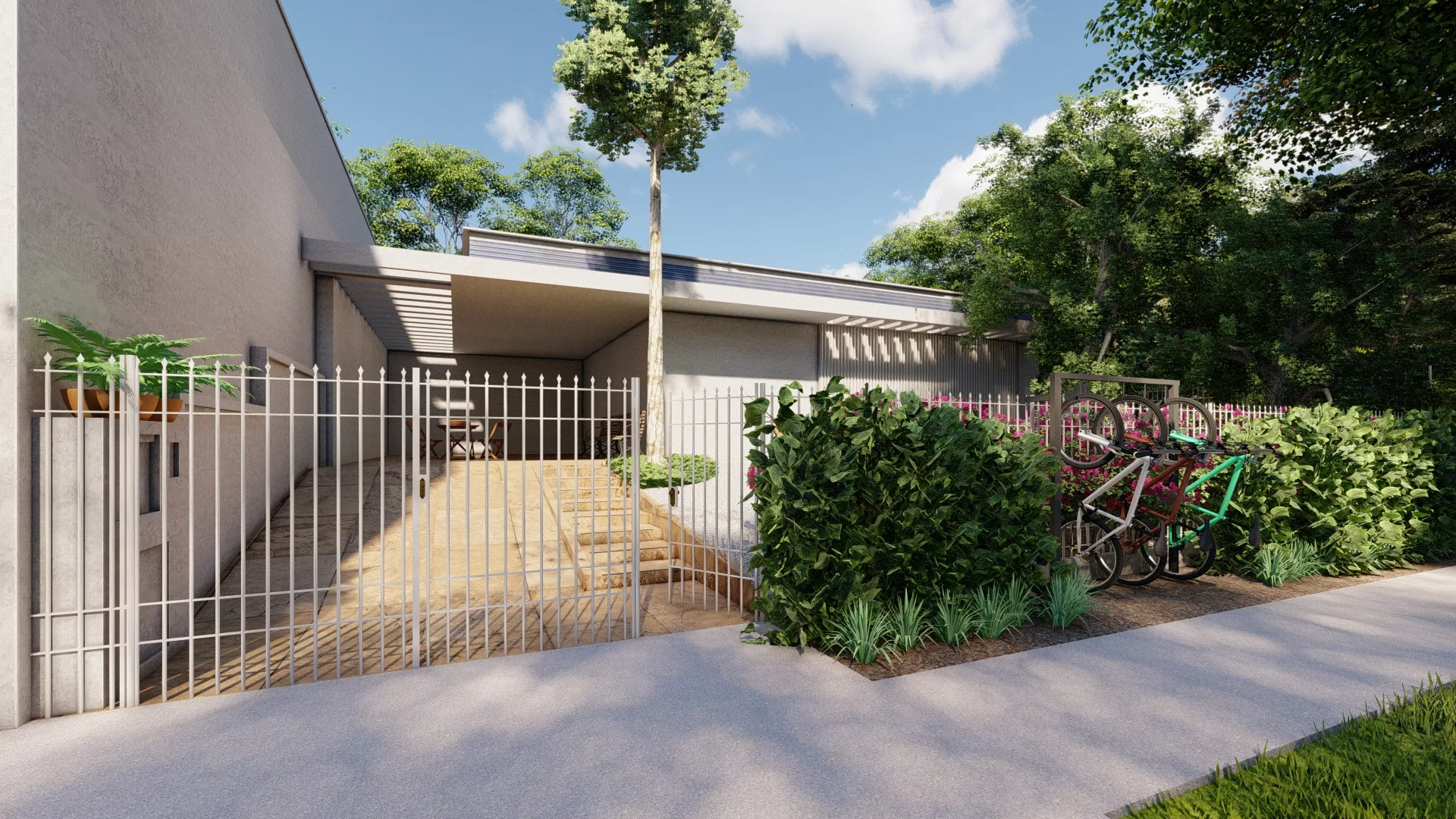 Gated side access with bicycles parked beside shrubs and a foliage planter