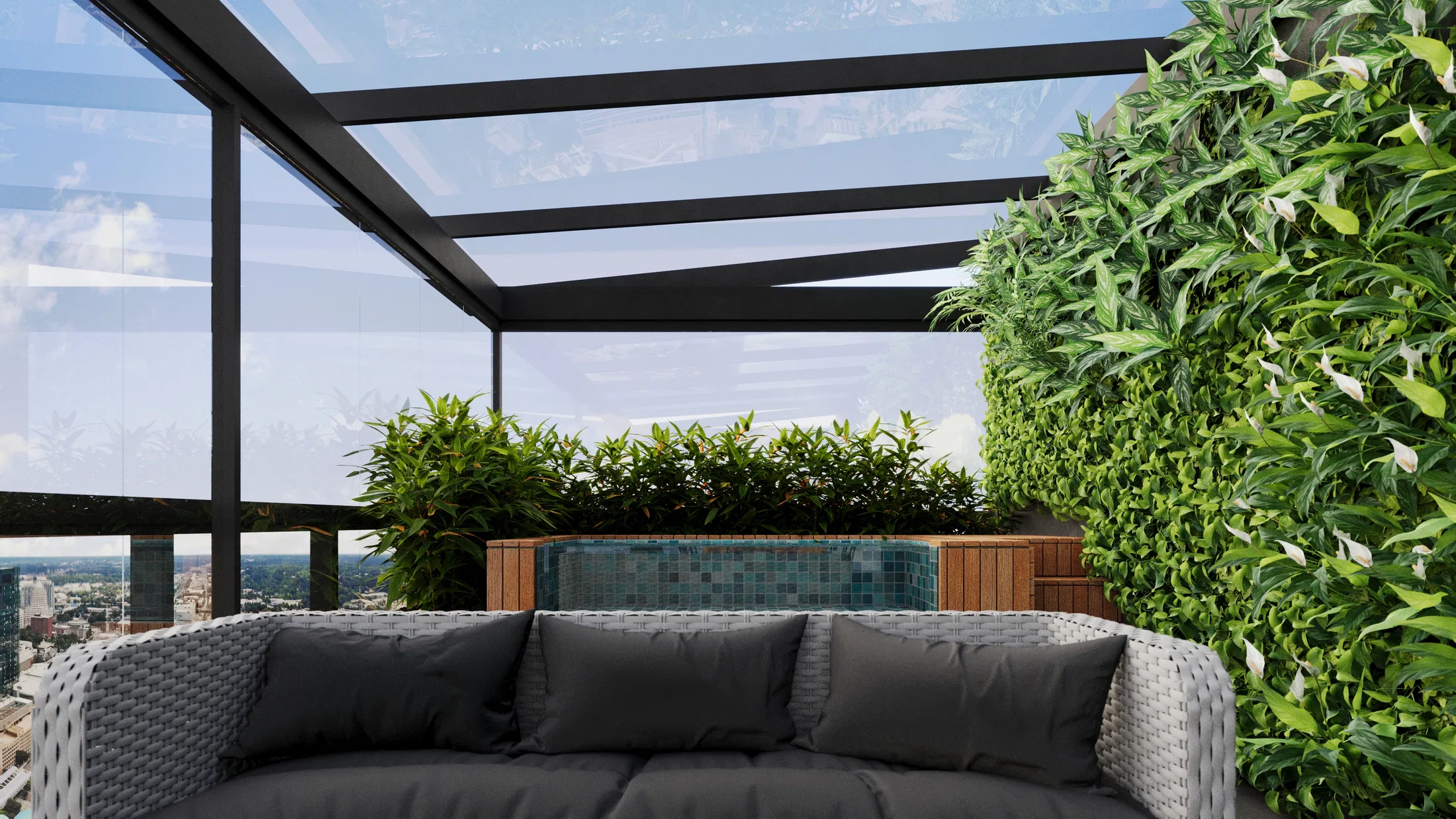 Grey wicker sofa with dark cushions facing a shrub bed, a mosaic water feature and a living wall to the right.