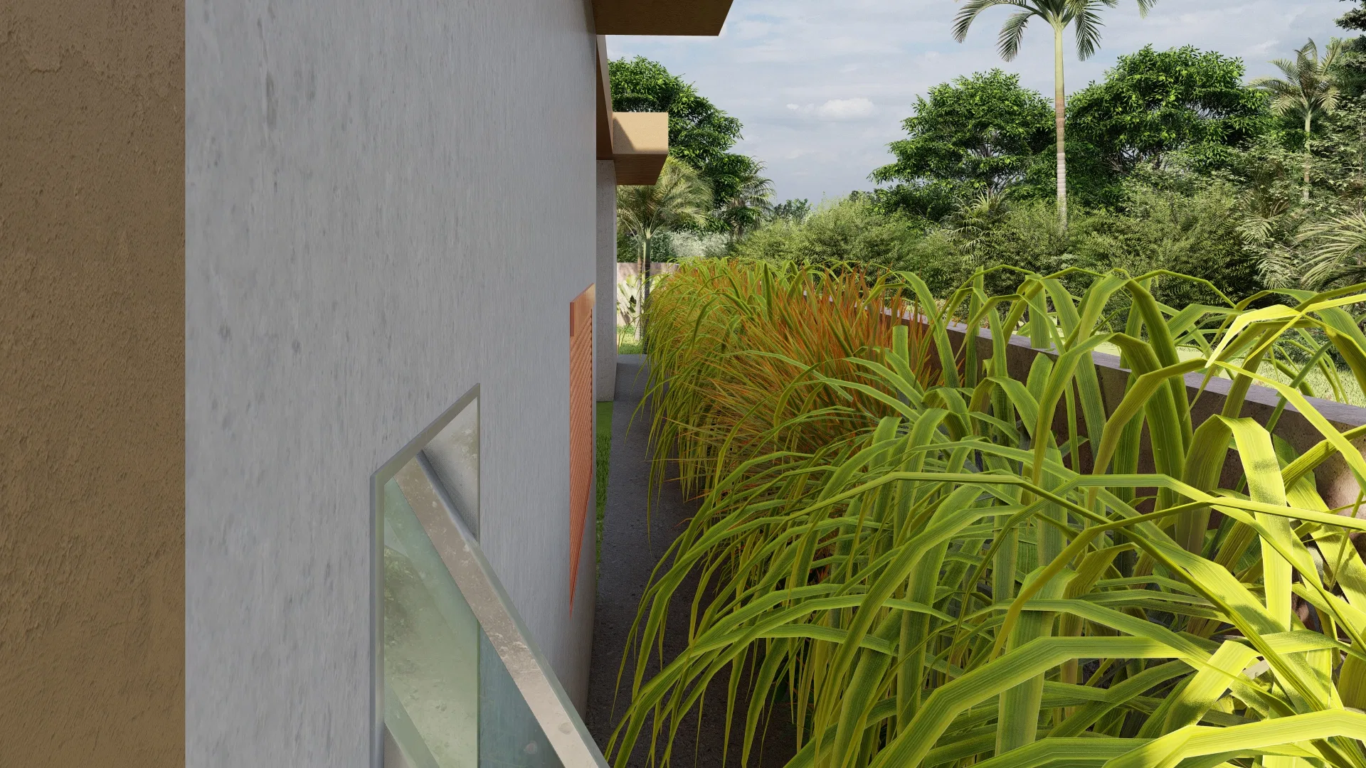 Narrow side corridor between the home's stone wall and a bed of golden ornamental grasses, with a skylight set flush to the ground.