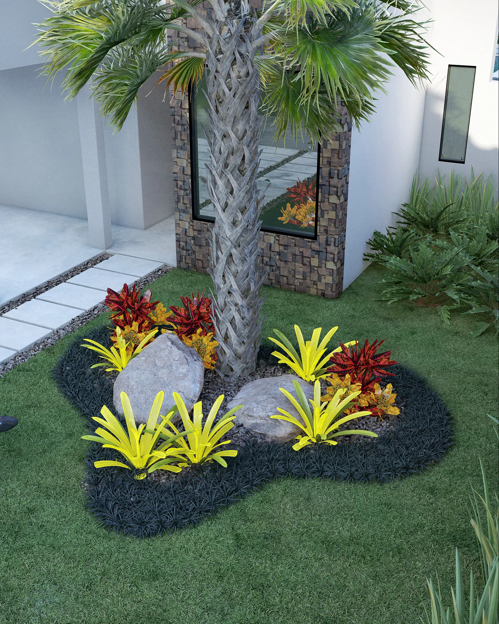 Close-up of the planting bed with boulders and red and yellow bromeliads around the palm tree's base