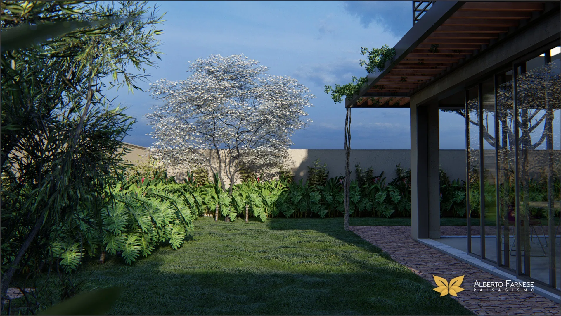 Back garden at dusk with a white flowering tree, a bamboo bed and a living room glimpsed beyond beneath a pergola