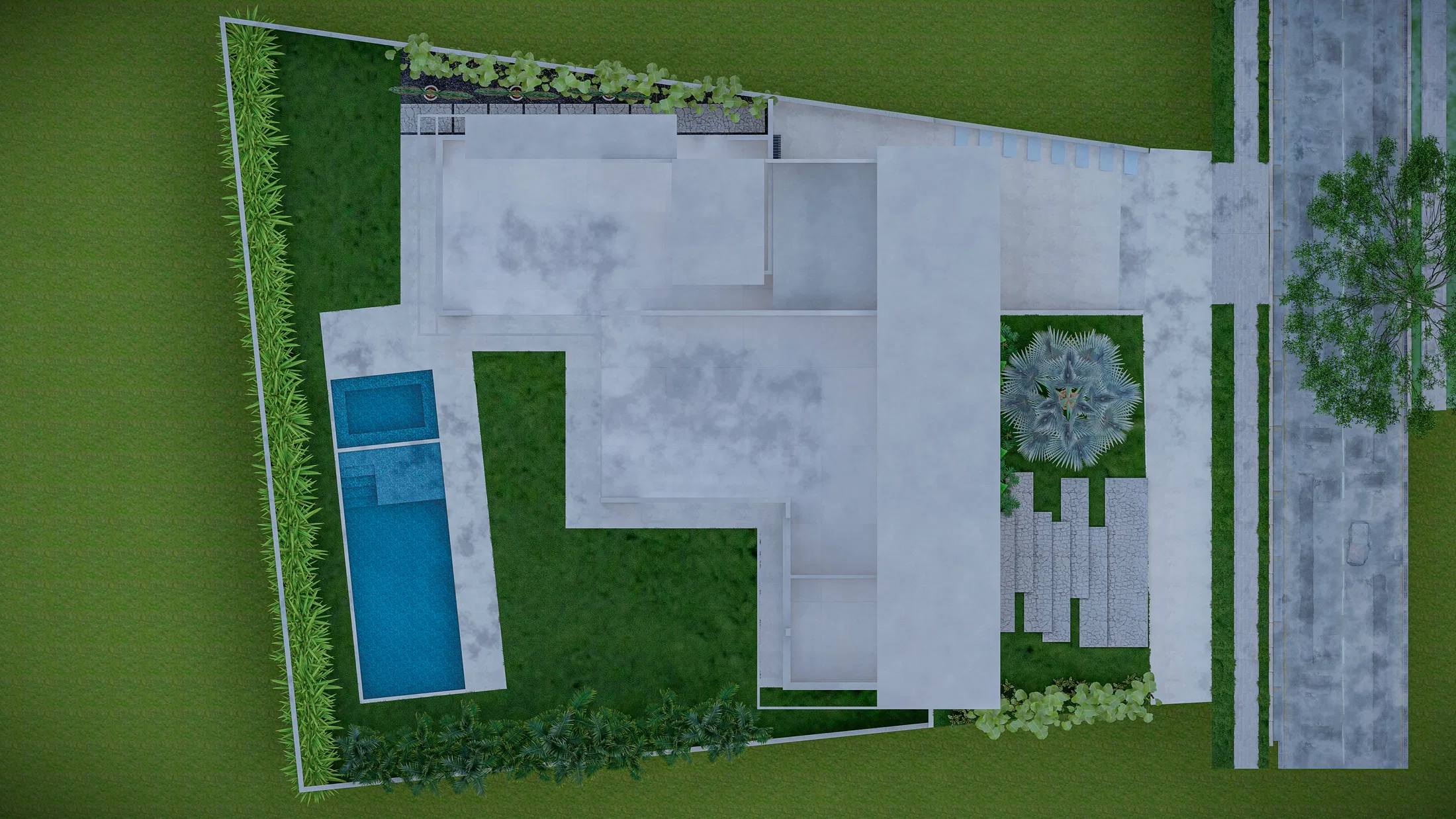 Aerial view of the lot showing the house roof, side pool, stone walkways and lawn framed by vegetation along the edges.