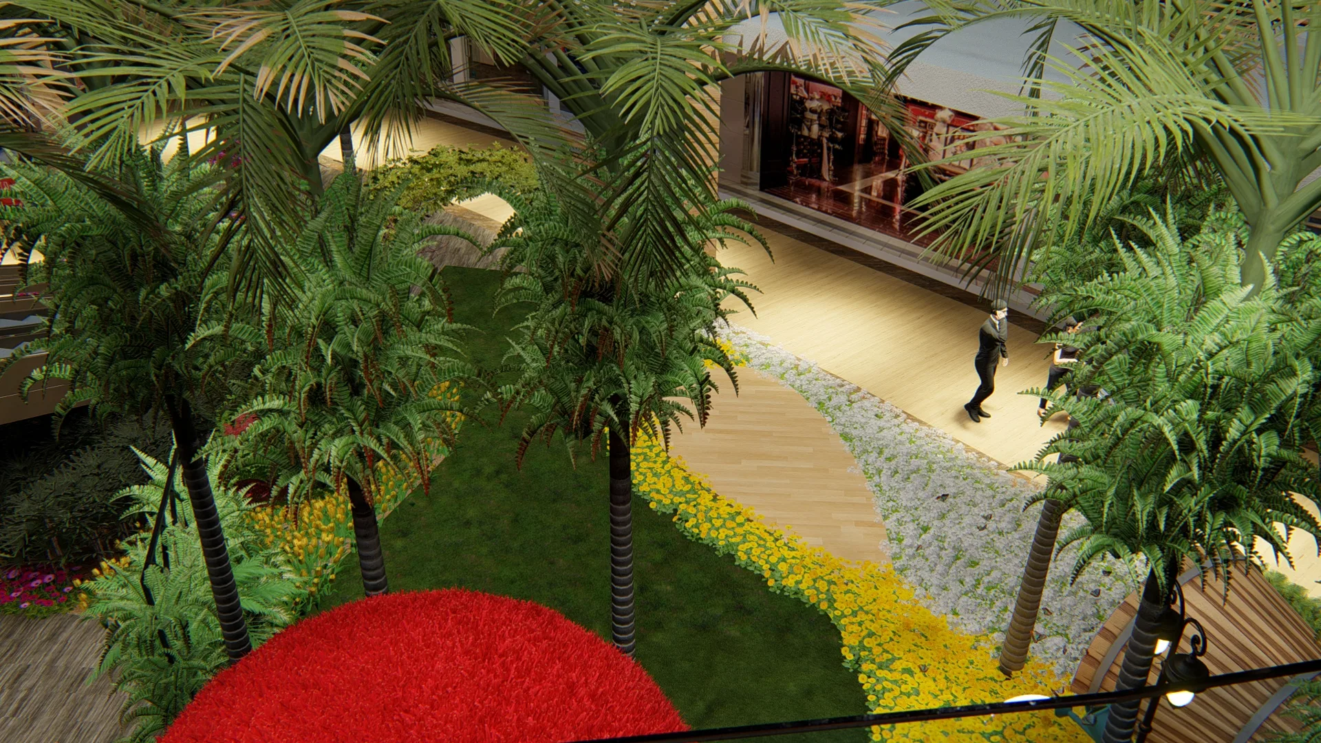 Overhead view of the indoor garden with palms, a winding path of white pebbles and yellow flowers, lawn and a figure crossing the timber floor