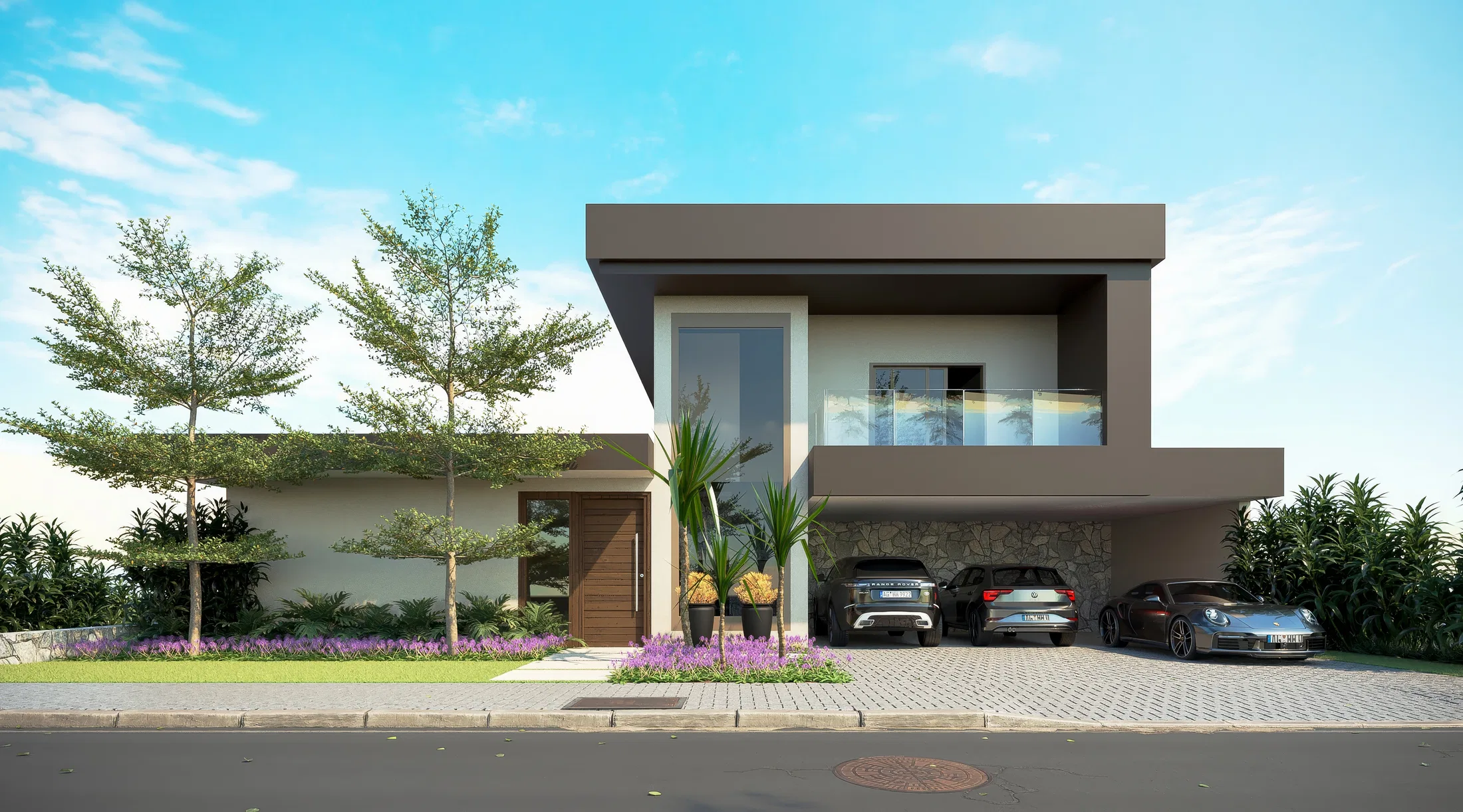 Two-story facade with a cantilevered upper volume, a glazed stair tower, a three-car carport and beds of purple flowers