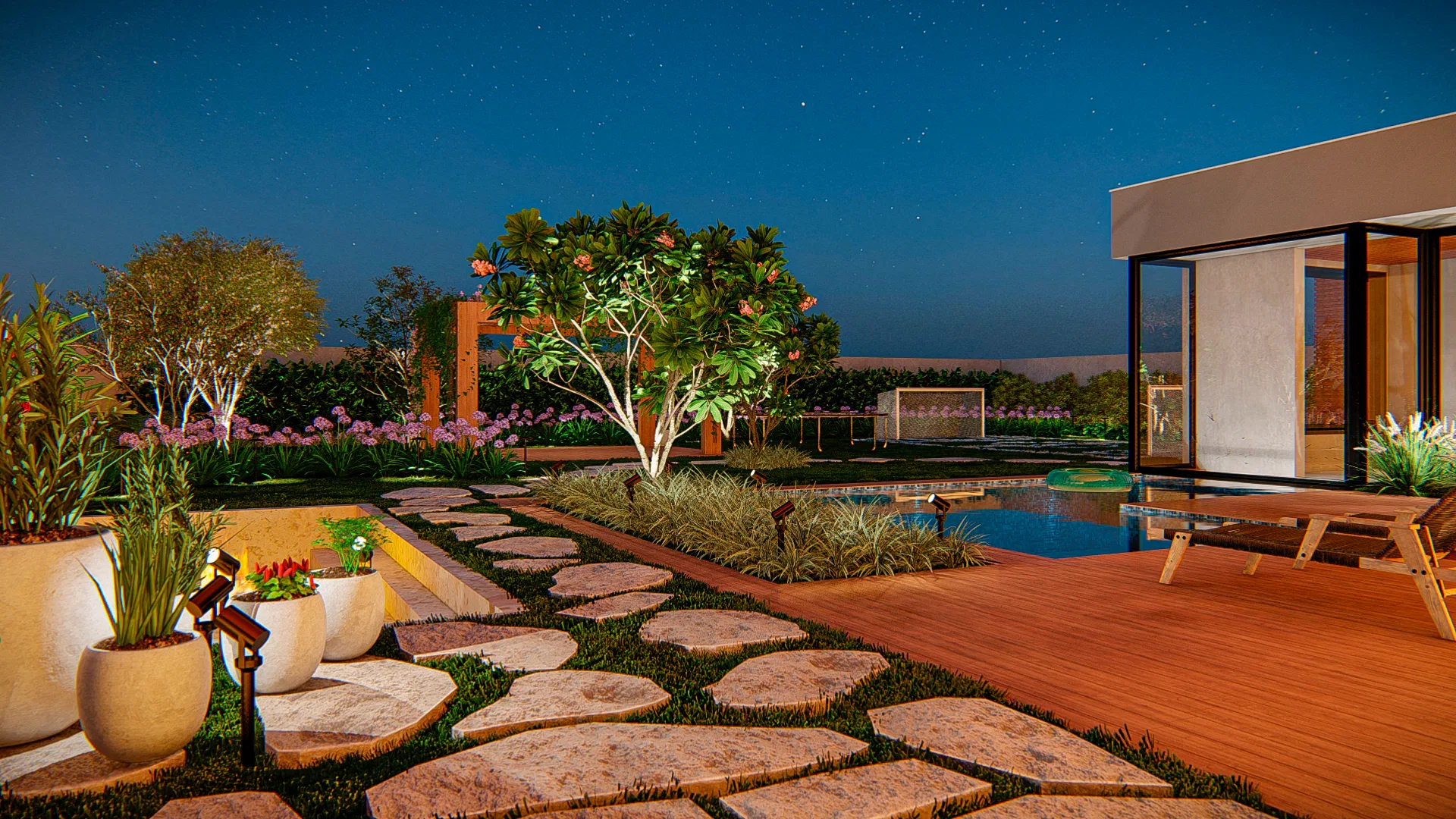 Backyard garden at night, with a timber deck, a pergola over a flowering tree, purple agapanthus and stepping stones among lit planters