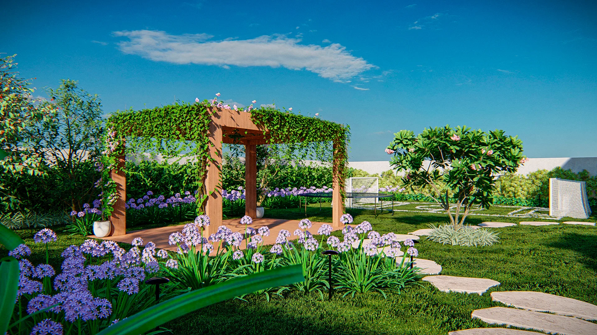 Timber pergola clad in flowering climbers over a deck, ringed by masses of purple agapanthus and a stone path across the lawn, under a blue sky