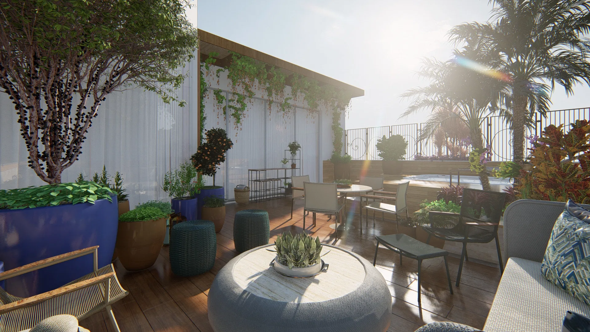 Lounge setting in warm backlight, with a woven low table, blue planters, a green wall and palms over the deck