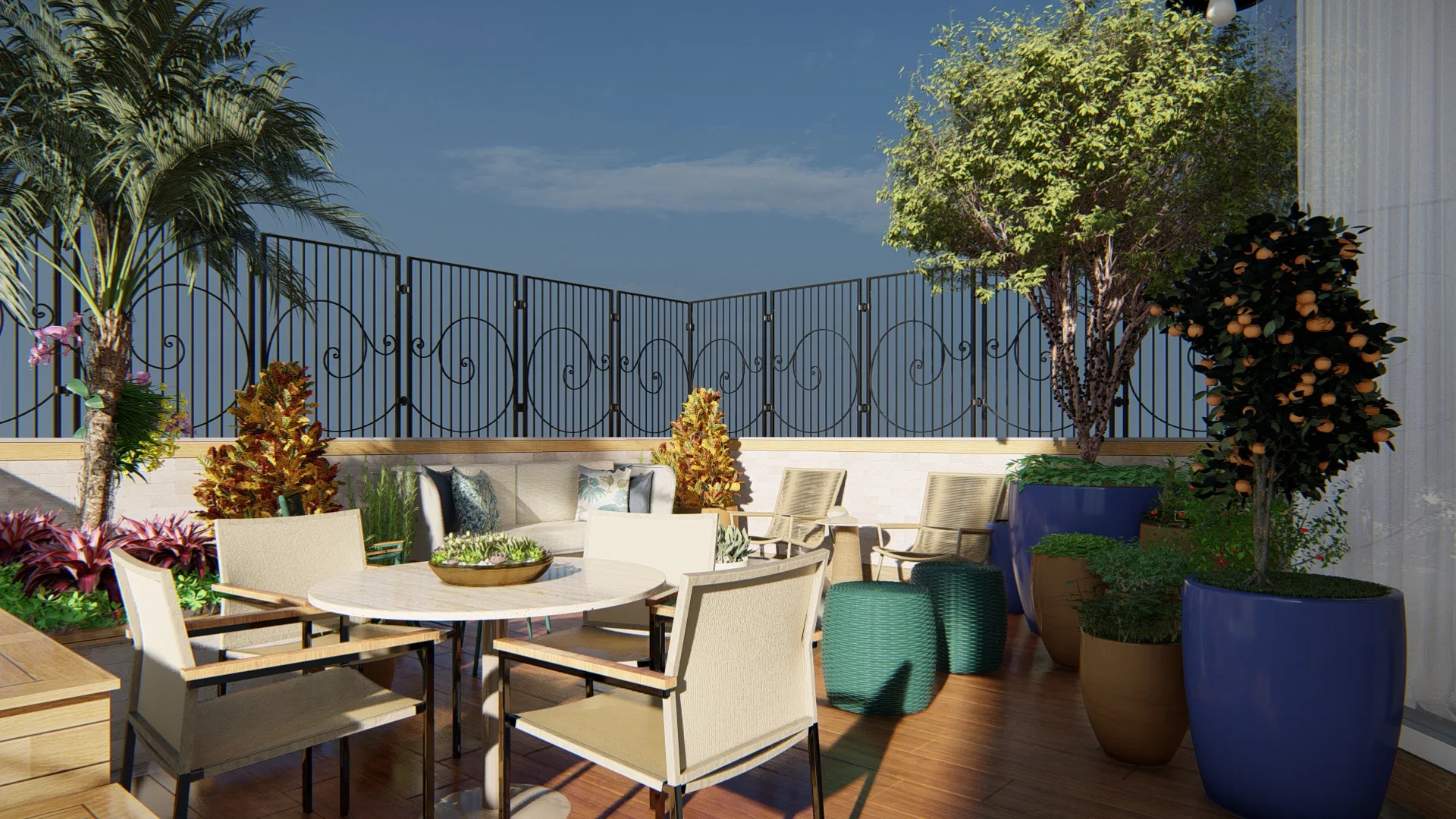 Dining corner with a round white table, a bench sofa, a potted orange tree and palms, and a scrolled iron railing