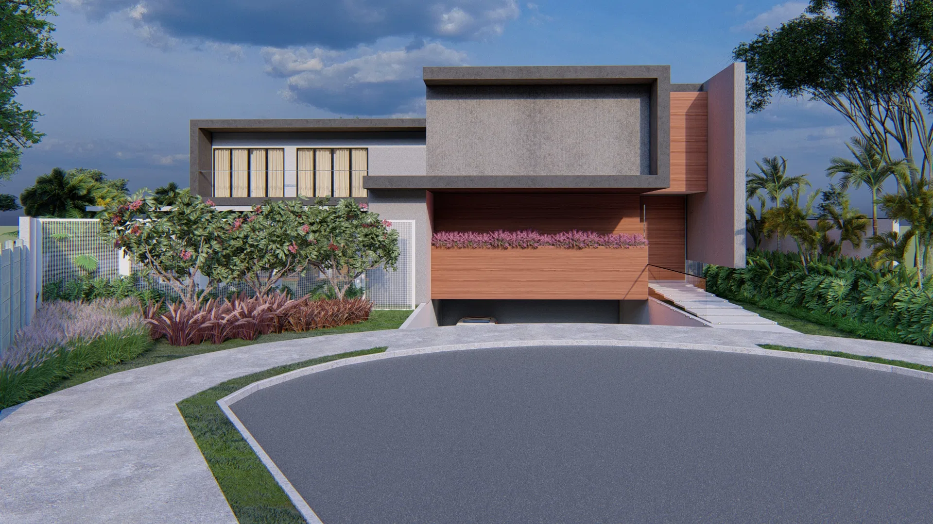 Front facade at dusk in concrete and wood, with a pink-flowering shrub, ornamental grasses and a curving paved driveway