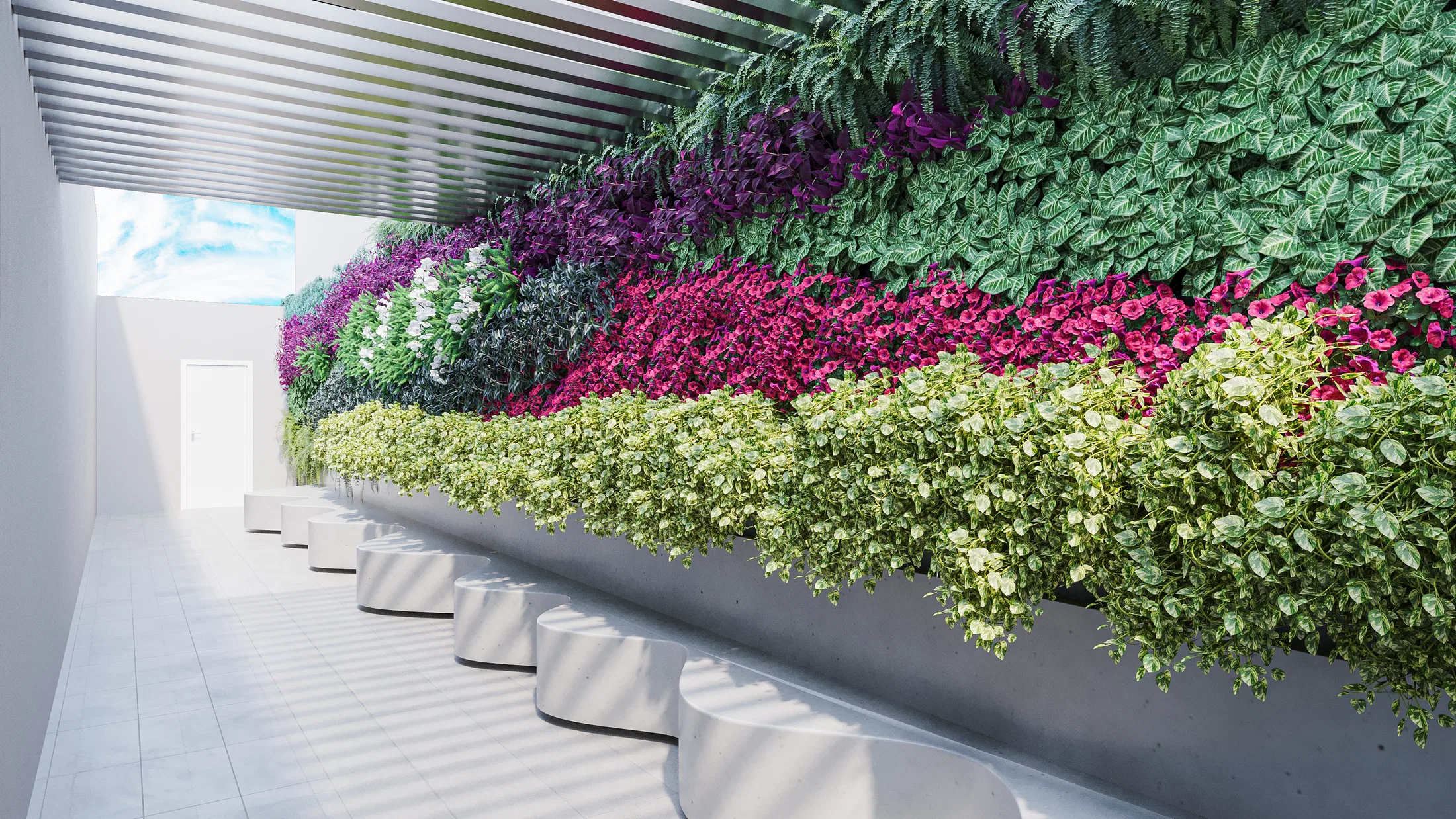 Covered corridor with rounded white benches along a flowering vertical garden wall in shades of green, magenta and purple