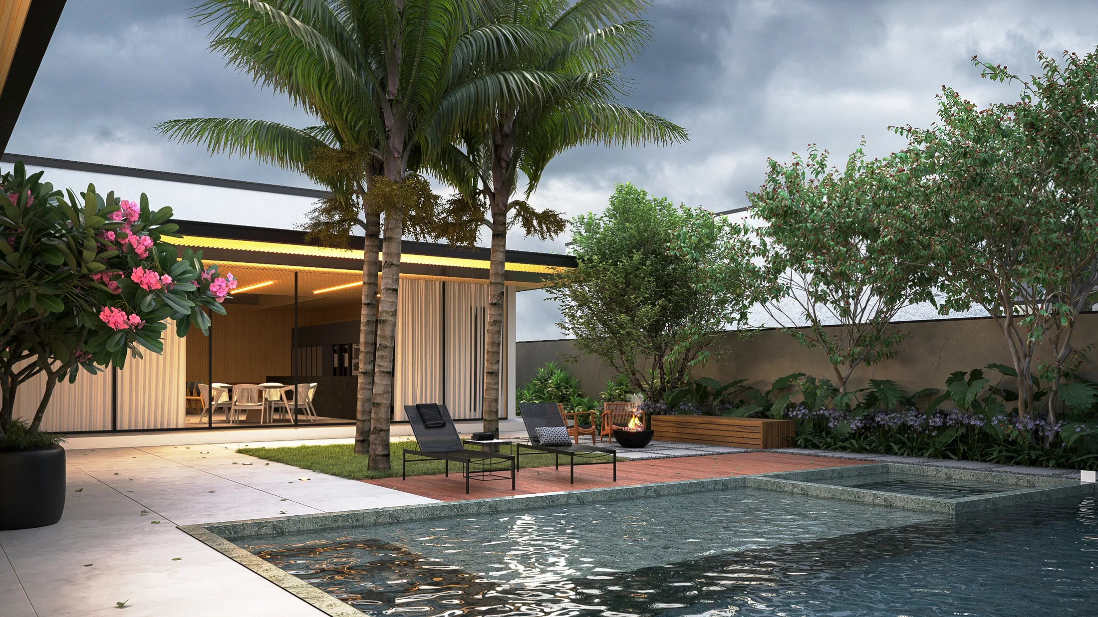 Pool at dusk mirroring palm trees, with loungers on a timber deck and a glazed living room behind
