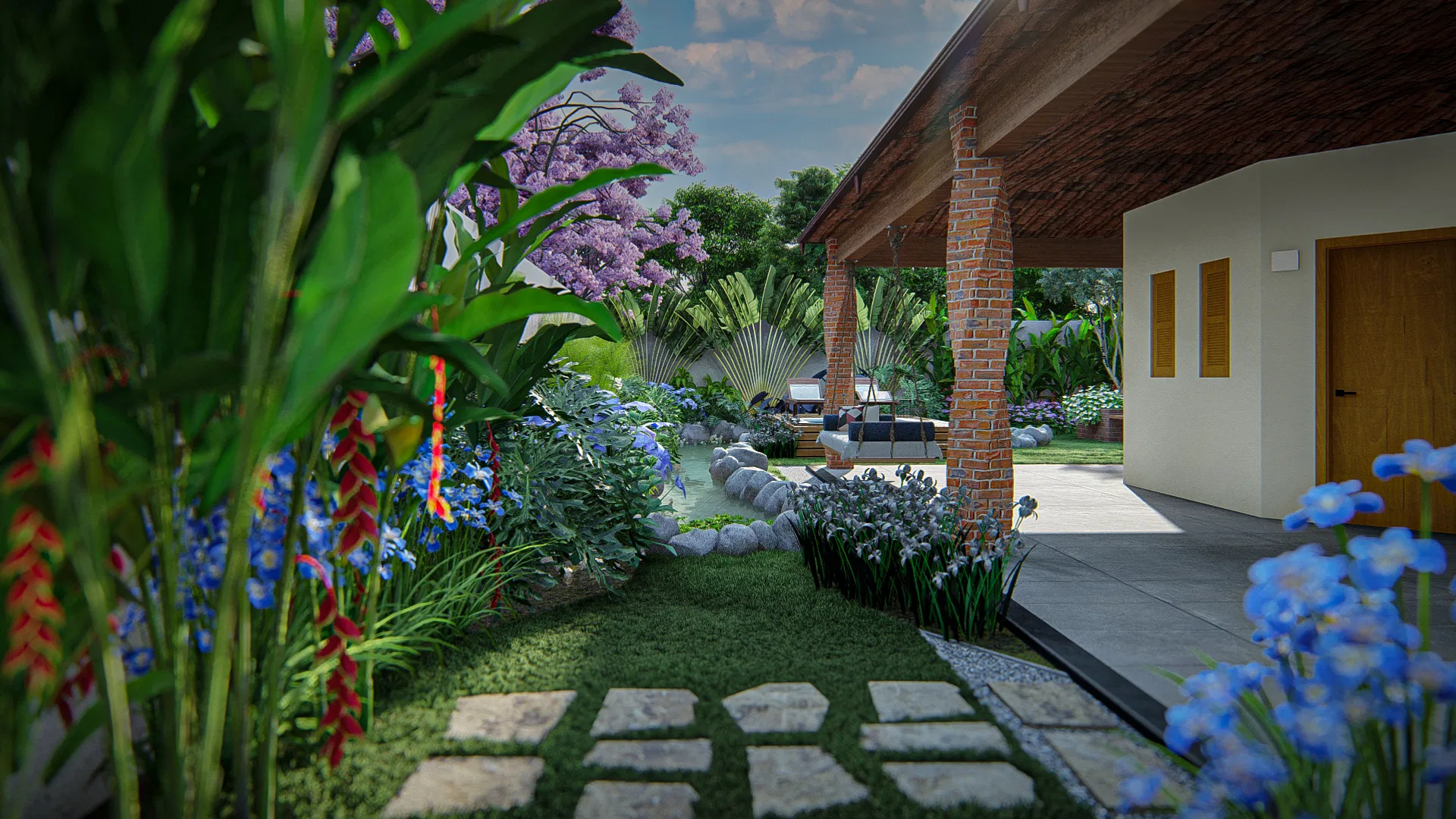 Stone stepping path through a tropical garden of heliconias and blue agapanthus leading to a brick-columned covered porch