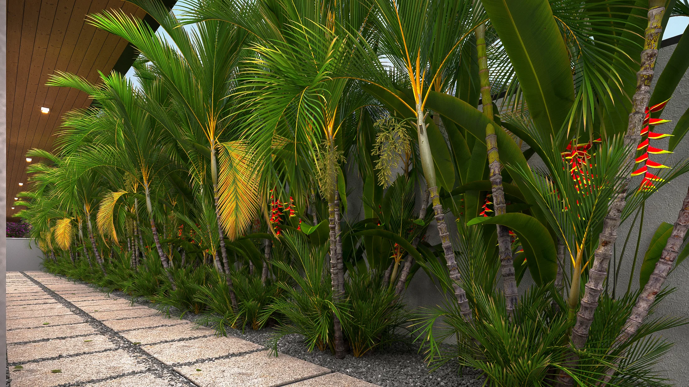 Row of palms and tropical foliage with red heliconias against a grey wall, beneath a lit slatted eave, with a stone walkway to the left