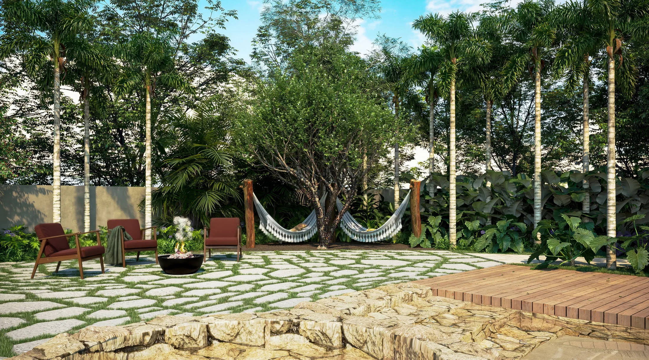 Outdoor lounge with red armchairs, a round fire bowl and hammocks between wooden posts under a tree, with a timber deck alongside
