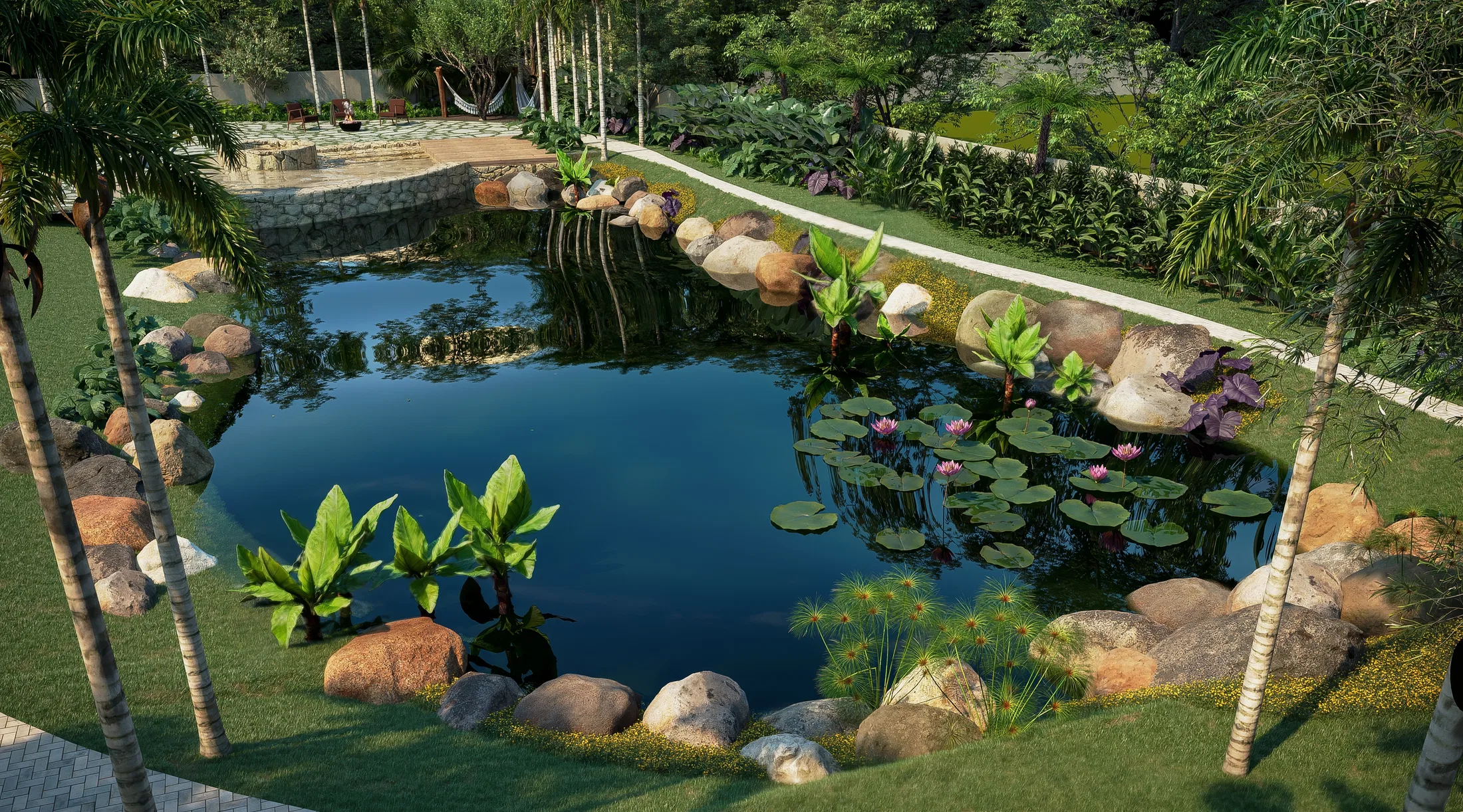 Naturalistic pond with pink water-lily blooms, heliconia foliage and palms, reflecting the stone lounge beyond