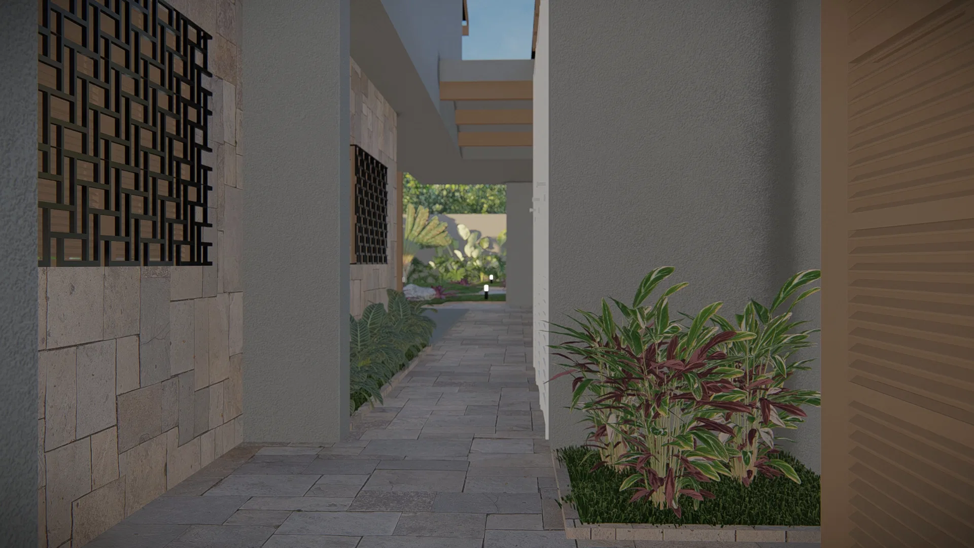 Side corridor with perforated panels, a green-and-red foliage bed against the wall and access to the garden