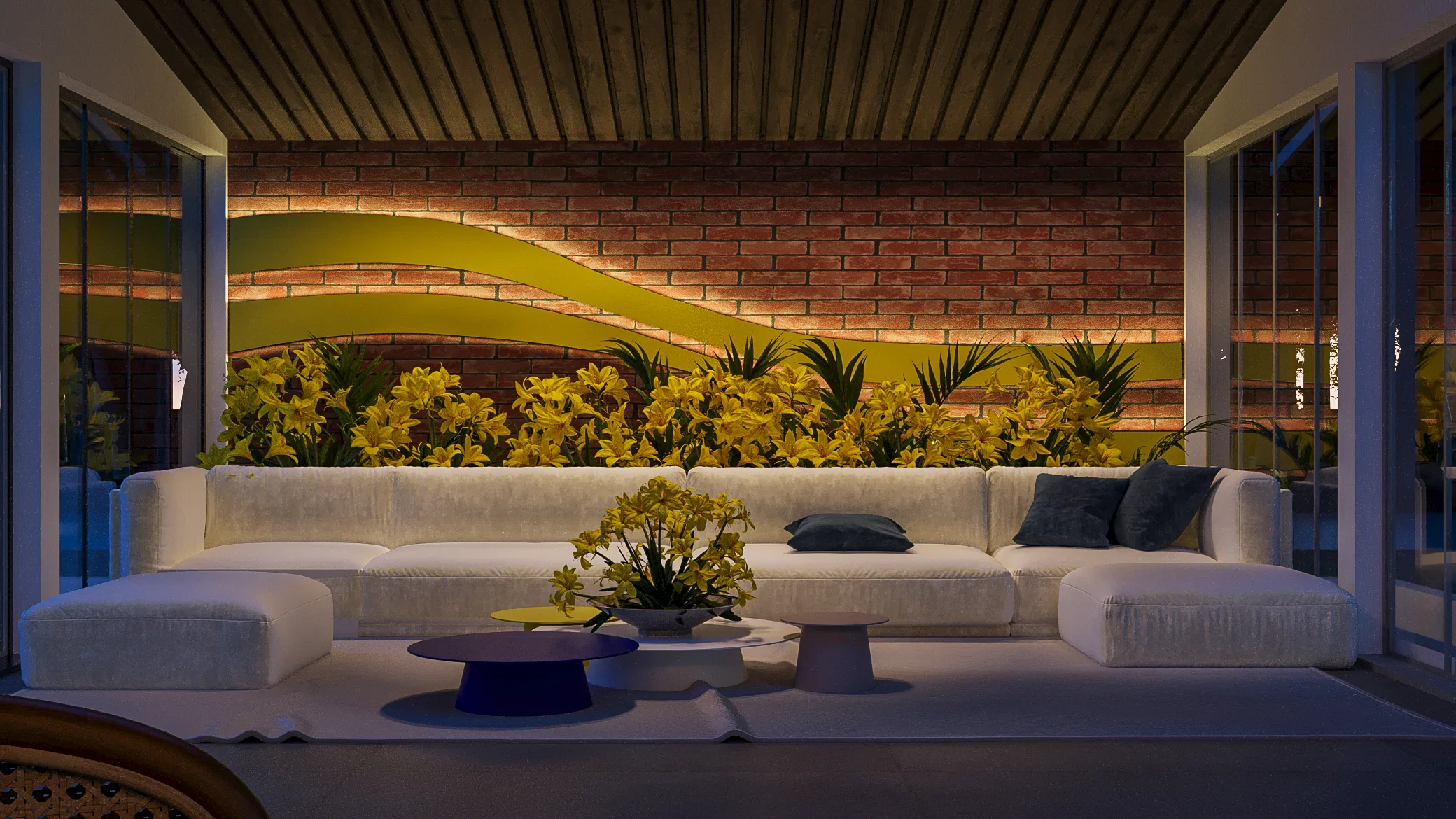 Covered lounge with a timber-slat ceiling, a white modular sofa and a brick wall with a backlit green wavy relief and yellow flowers