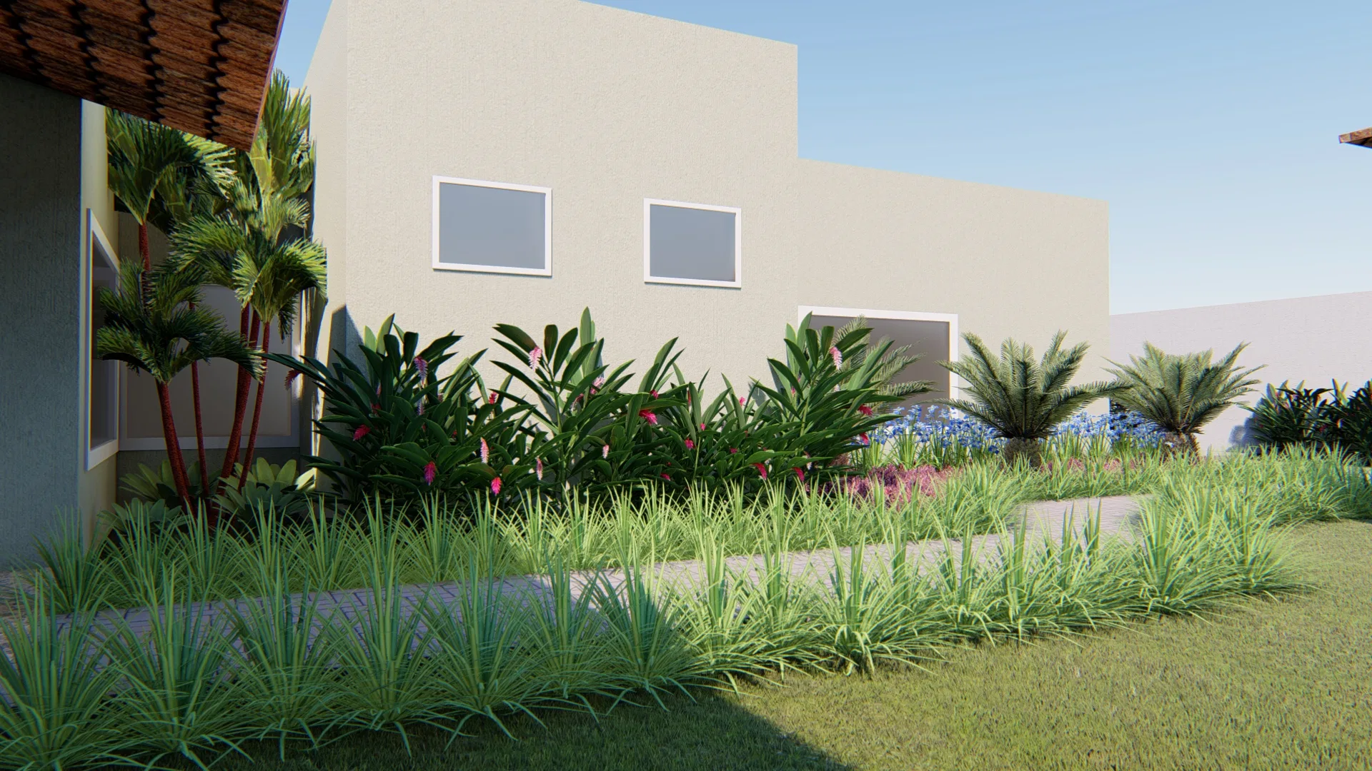 Residence facade with a bed of variegated tropical foliage, palms and clusters of blue flowers near the entrance