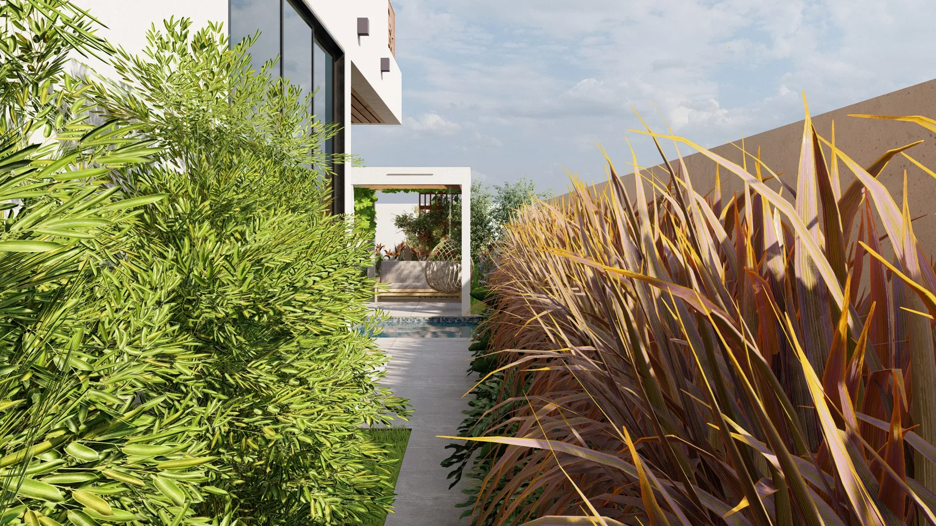 Side corridor with bamboo on one side and a bed of reddish ornamental grasses on the other, a paved path leading to the pergola and pool