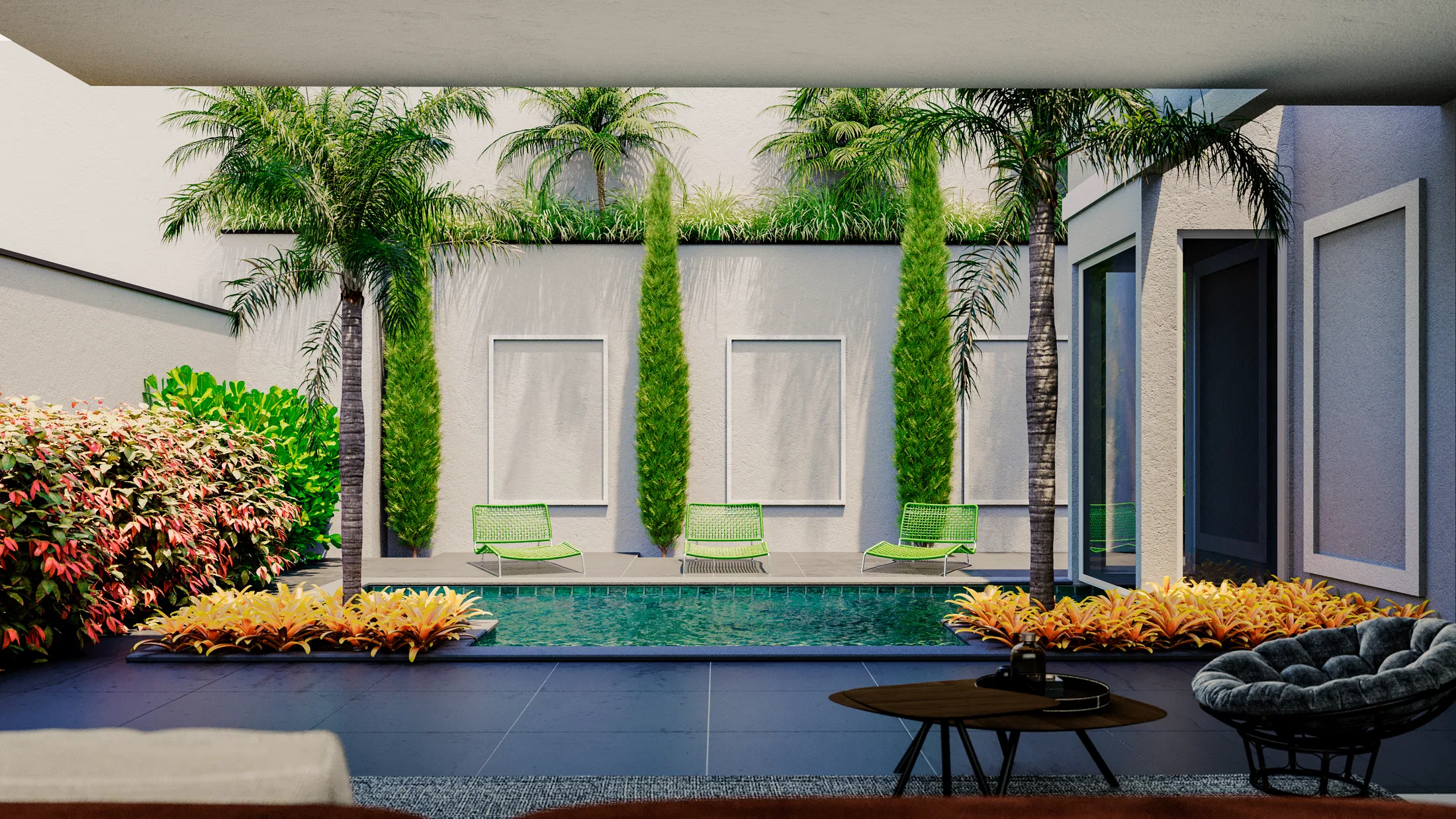 Lap pool framed by cypresses and palm trees, with green lounge chairs and a white wall behind
