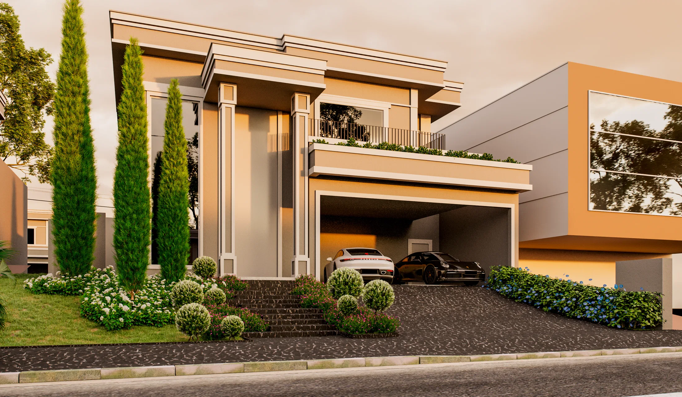 Closer view of the facade with cypresses, a bed of white and purple flowers and cars parked under the canopy