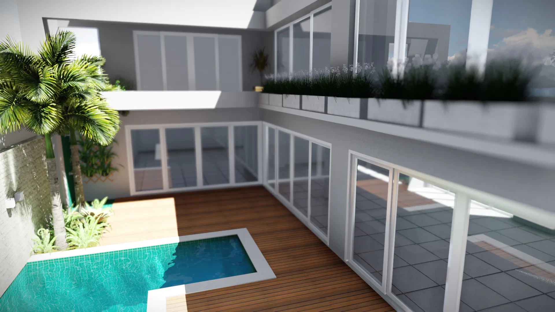 Elevated view of the leisure area with an L-shaped pool, wood deck, a palm and glass-walled rooms, with grass planters on the upper level