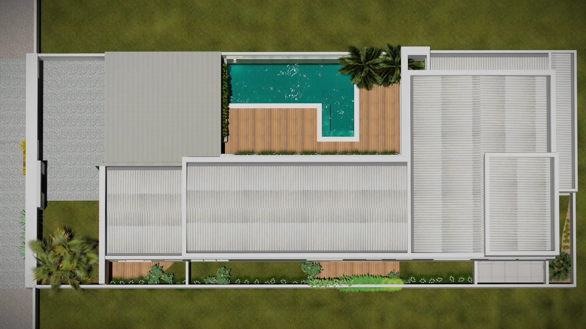 Aerial view of the lot with ribbed roofs, an L-shaped pool with wood deck at the center, palms and planting beds along the front