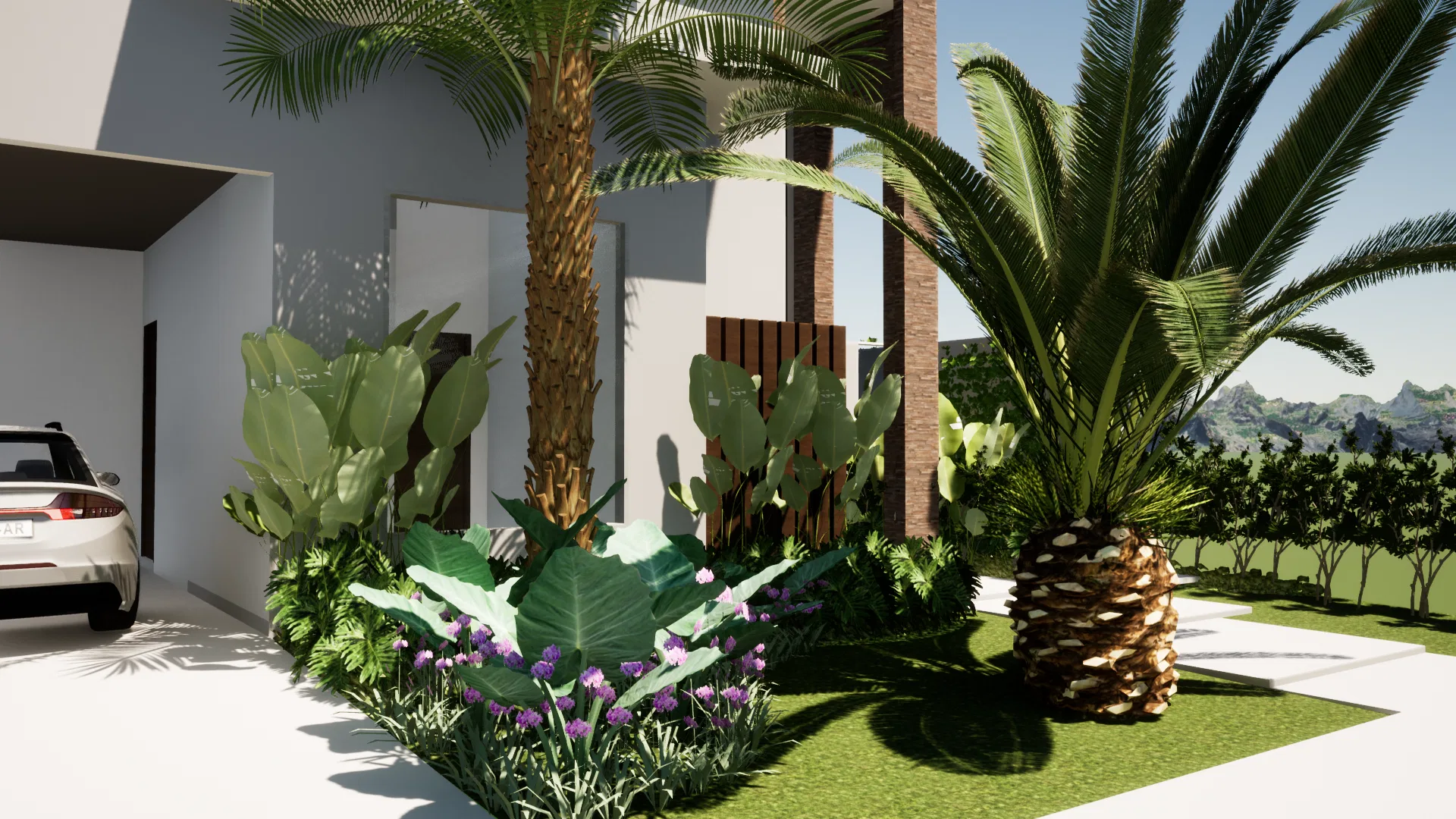 Close view of the entry garden with a stout palm trunk, banana leaves, cacti against the stone wall and a purple flowering groundcover.