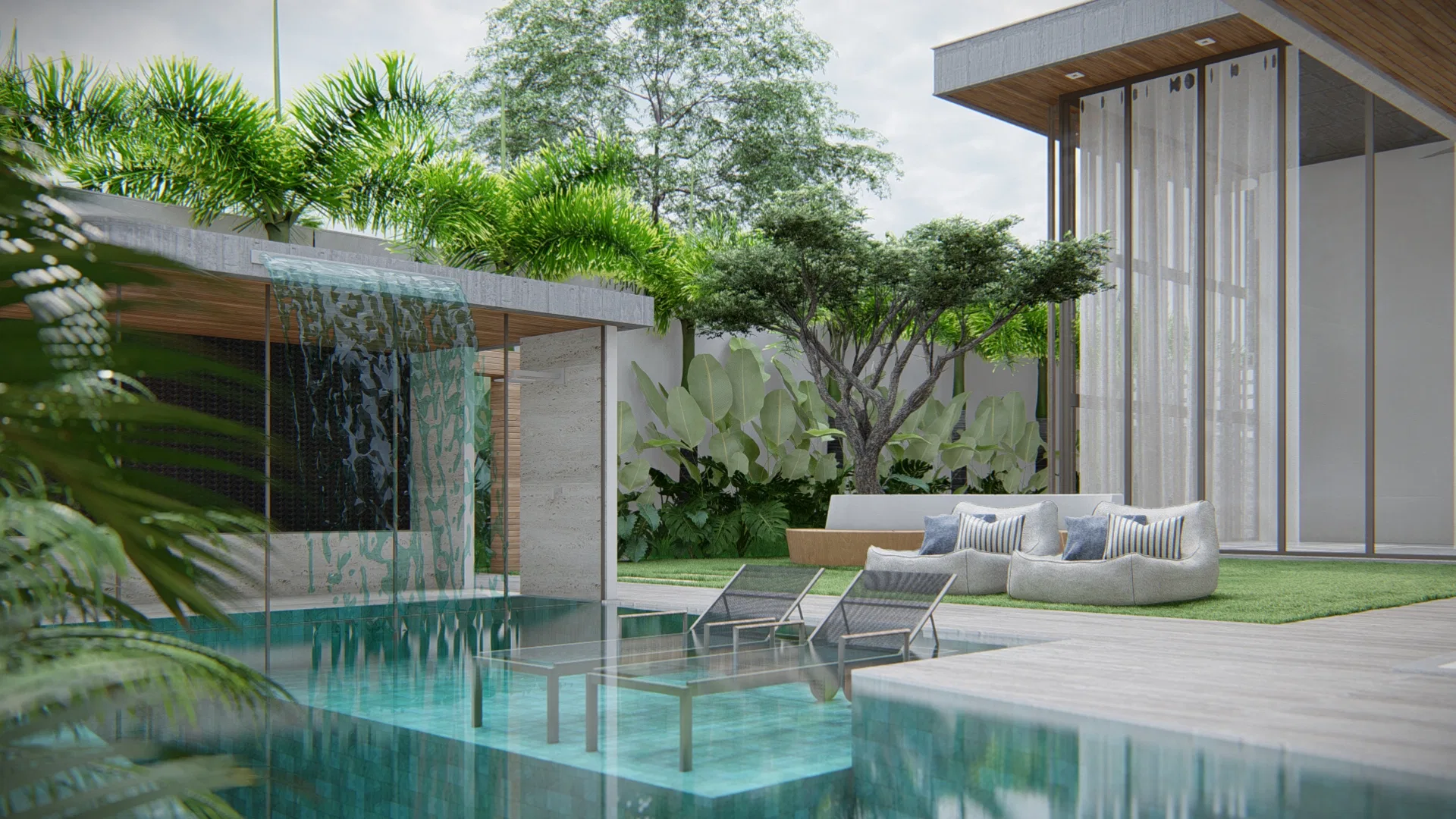 Pool with a cascading water wall, timber decking, sun loungers and lounge sofas beneath palm trees