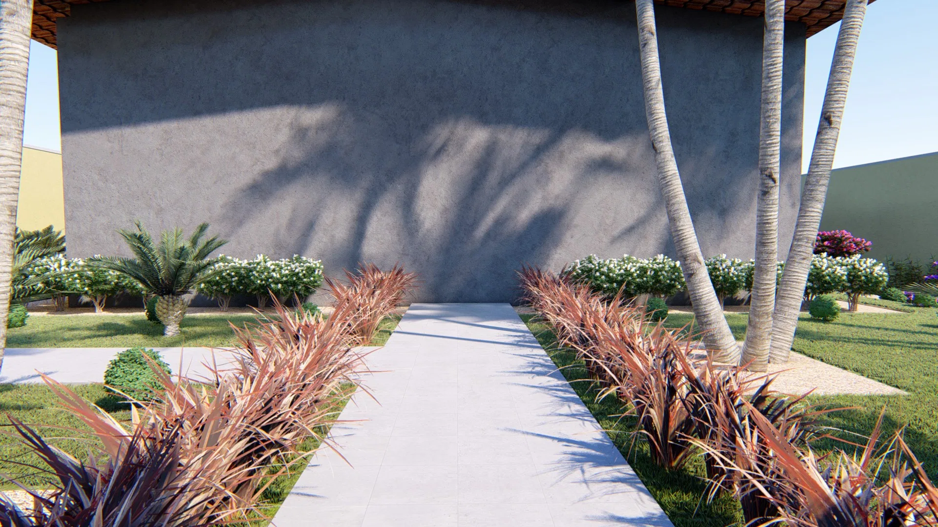 Pale paved walkway leading to the concrete wall, flanked by copper-toned spiky plants, white-flowering shrubs and palm trunks