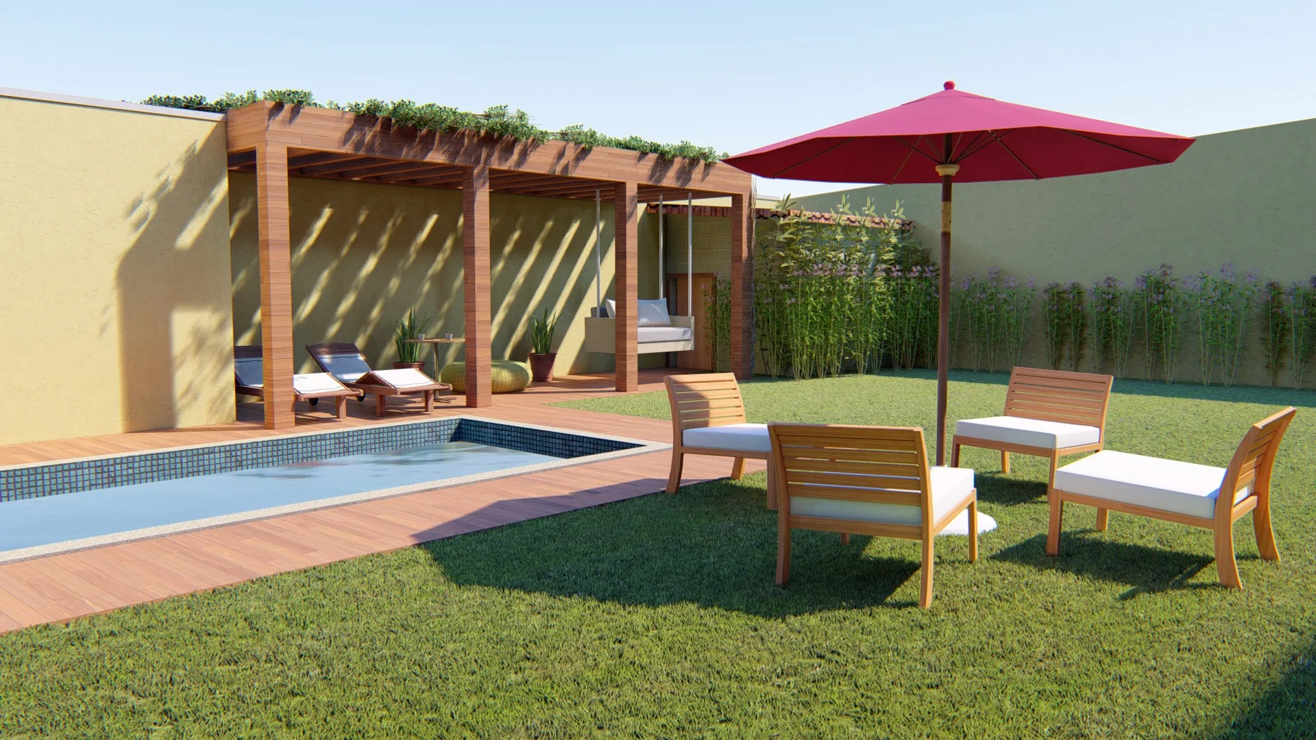 Pool area with a wooden deck, a pergola with climbers, loungers, a pink parasol and wooden armchairs on the lawn against a bamboo screen