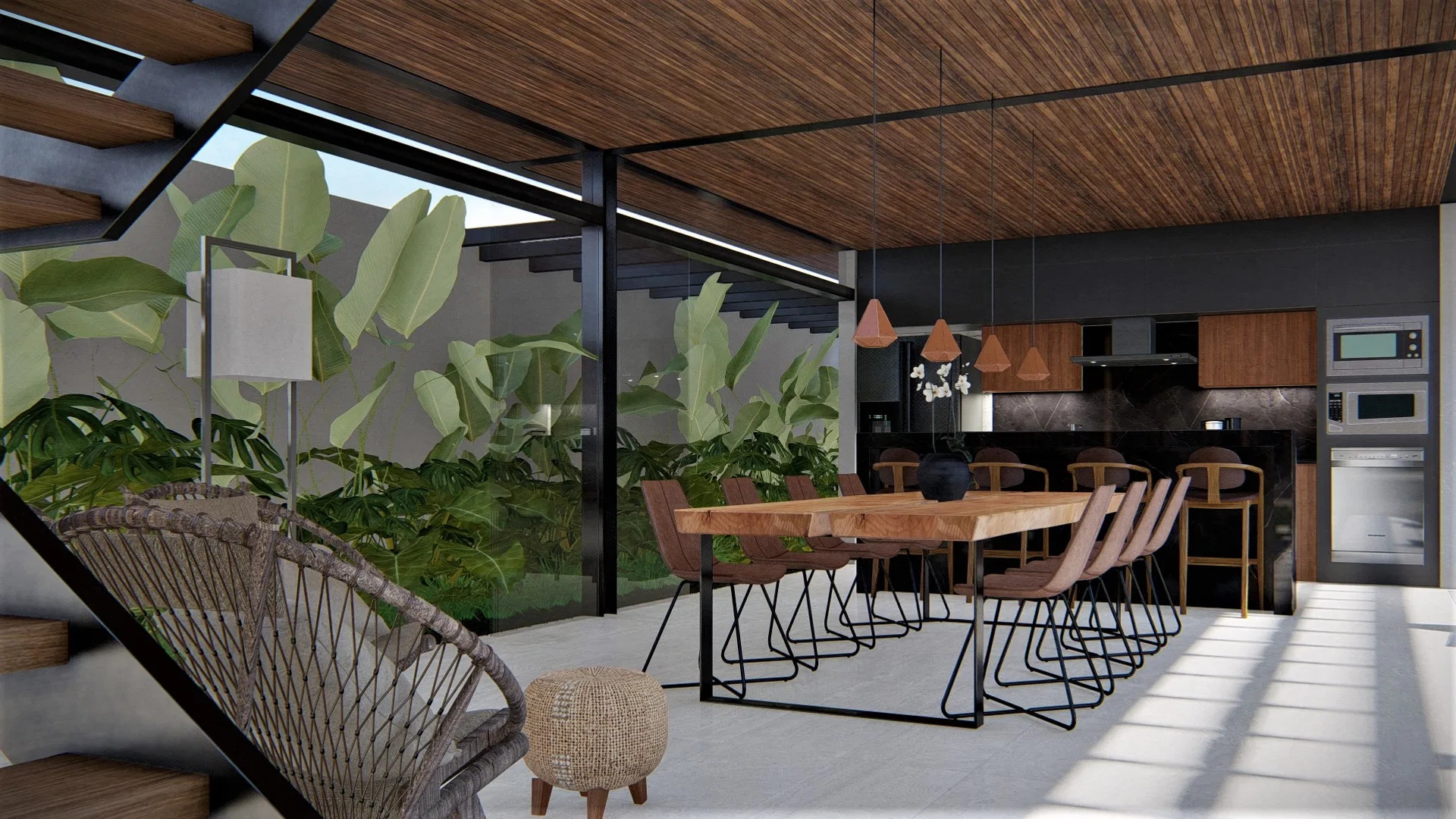 Dining area with a wood table and upholstered chairs, dark cabinetry in the kitchen beyond and tropical planting against the glass