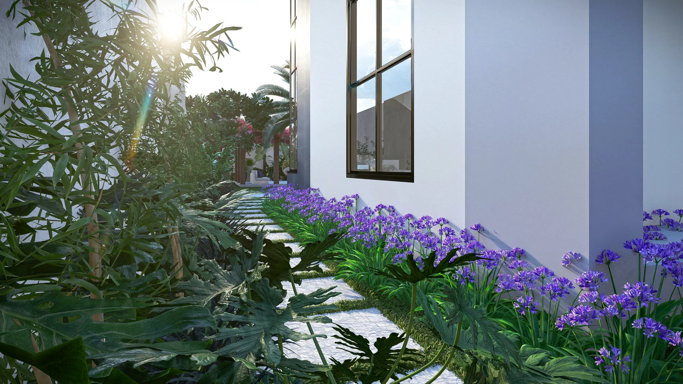 Side path through dense foliage, with philodendrons, bamboo and purple agapanthus lining the stone paving beside the house wall and a dark window