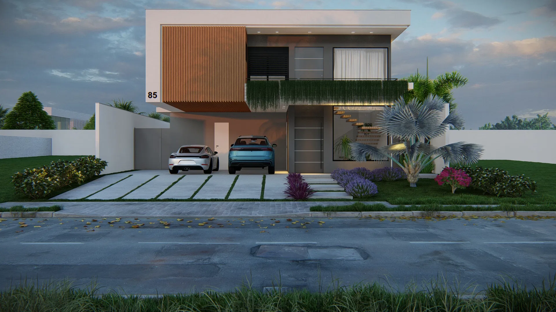 Two-storey facade at twilight with wood-slat cladding, two cars in the garage, a bed of lilac flowers and a silvery fan palm