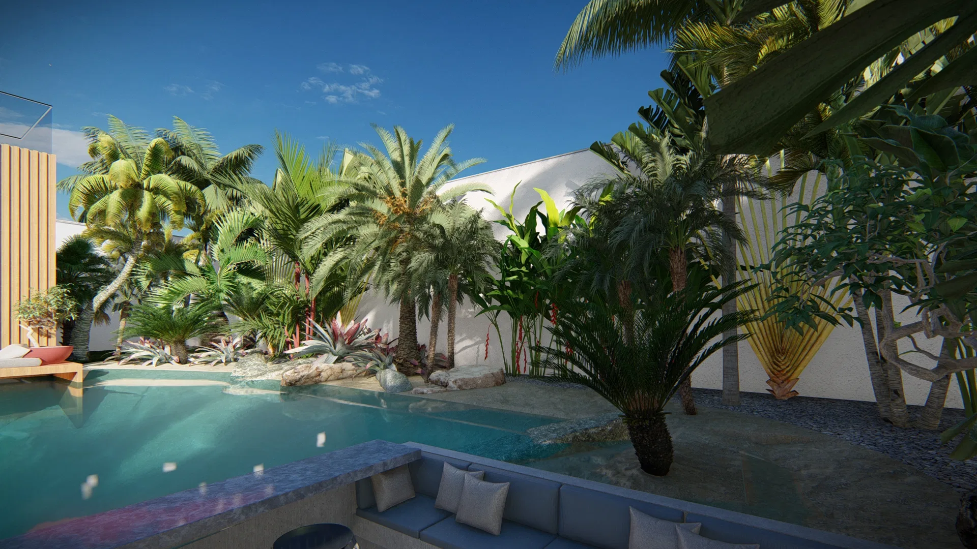 Pool with a sunken cushioned lounge in the foreground, wrapped by palms, cycads and tropical foliage under a deep blue sky