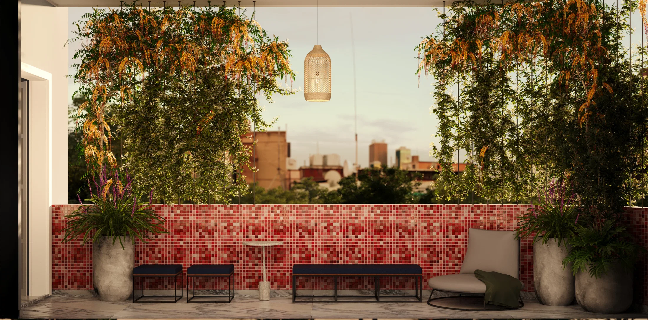 Gourmet balcony with red tile cladding, benches, an armchair and hanging vines framing the city view at dusk