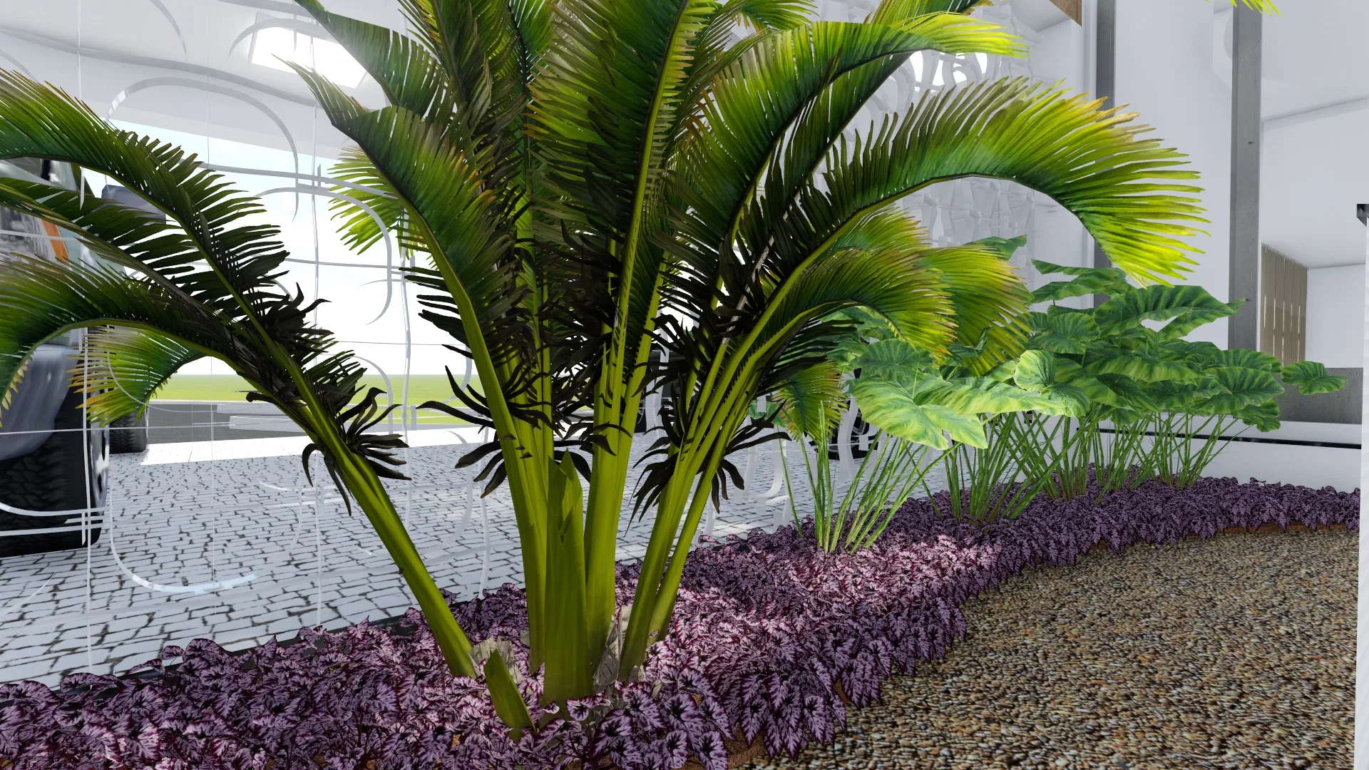 Close-up of a planting bed with a central palm over purple ground cover and a pebble bed, beside stone paving and tropical foliage