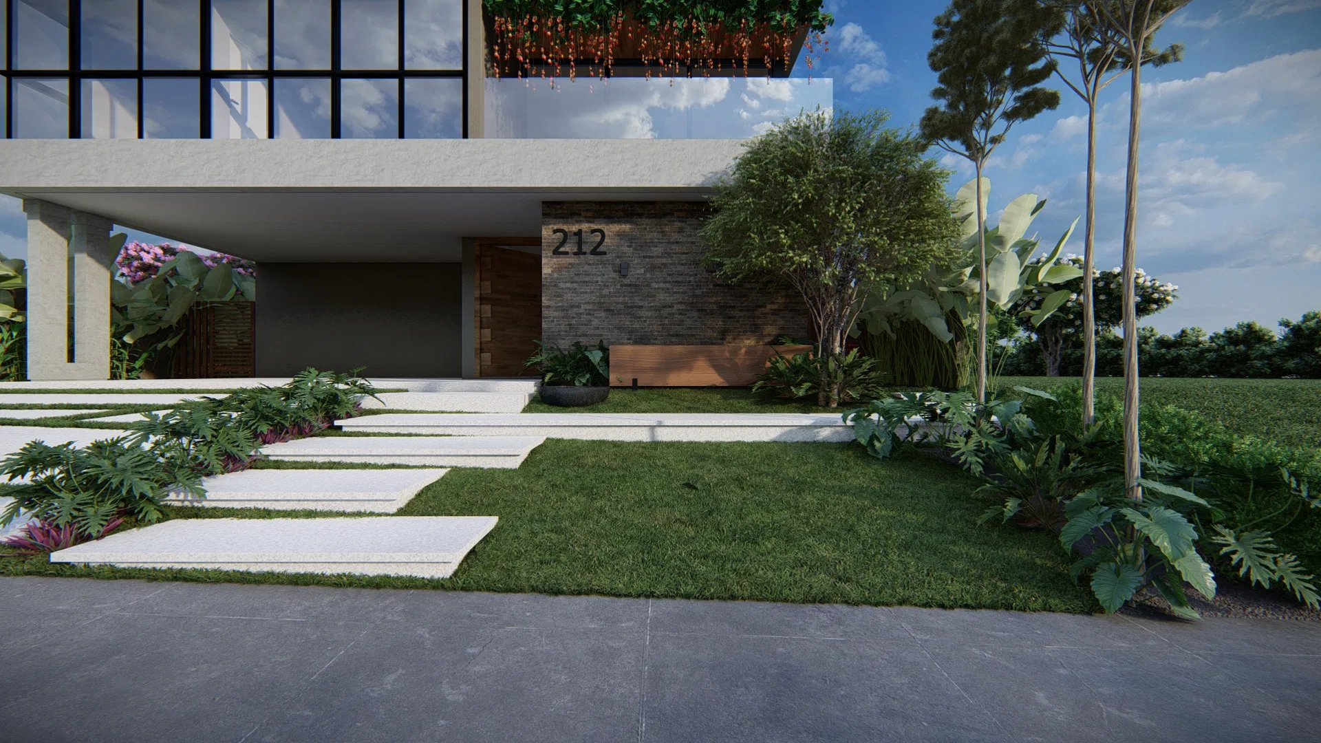 Closer view of the entrance with a garage door, flowering shrubs and grass strips between paving slabs