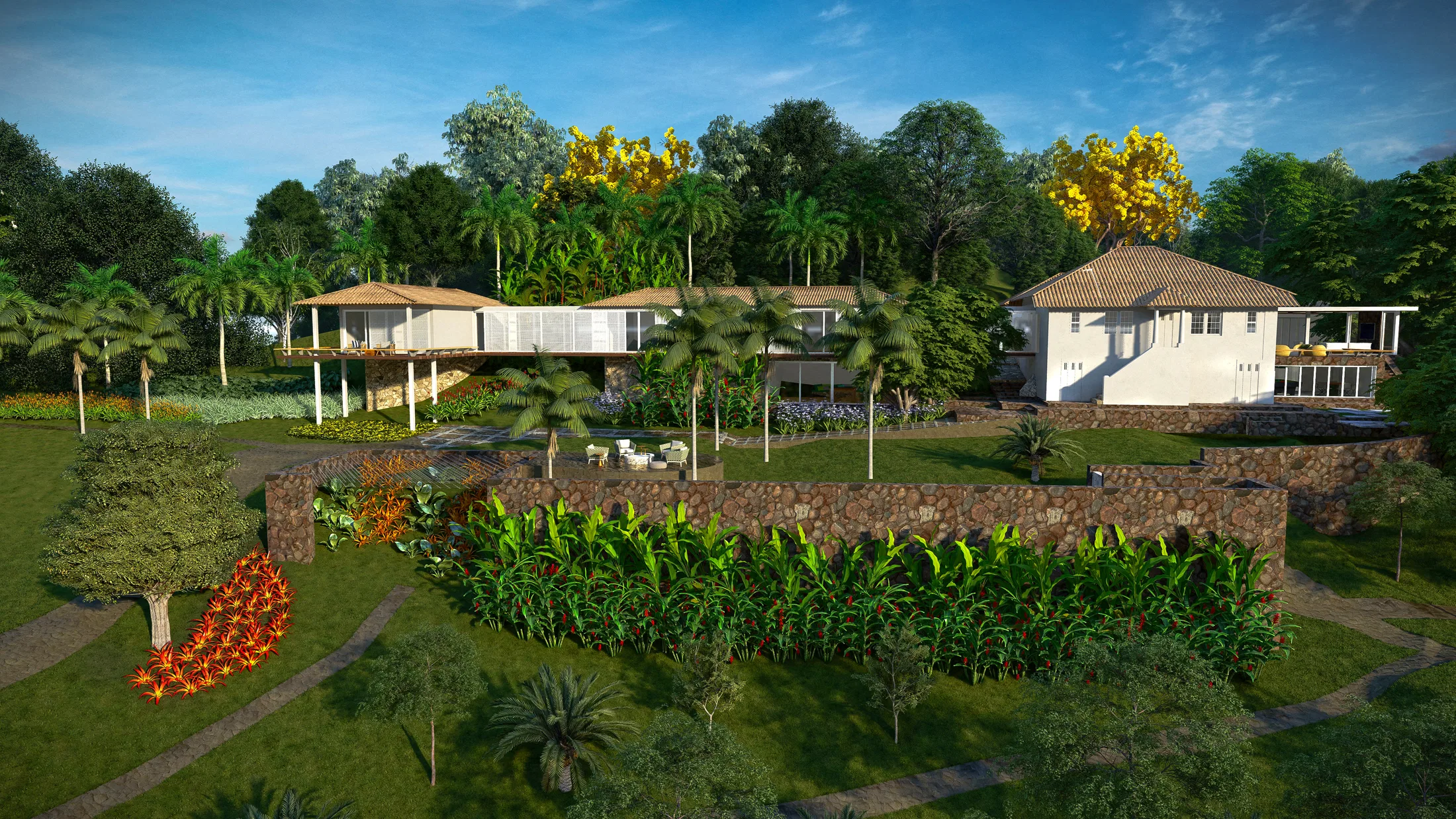 Aerial view of the residential complex with a stone wall, flowering beds and strips of vegetation between the buildings.