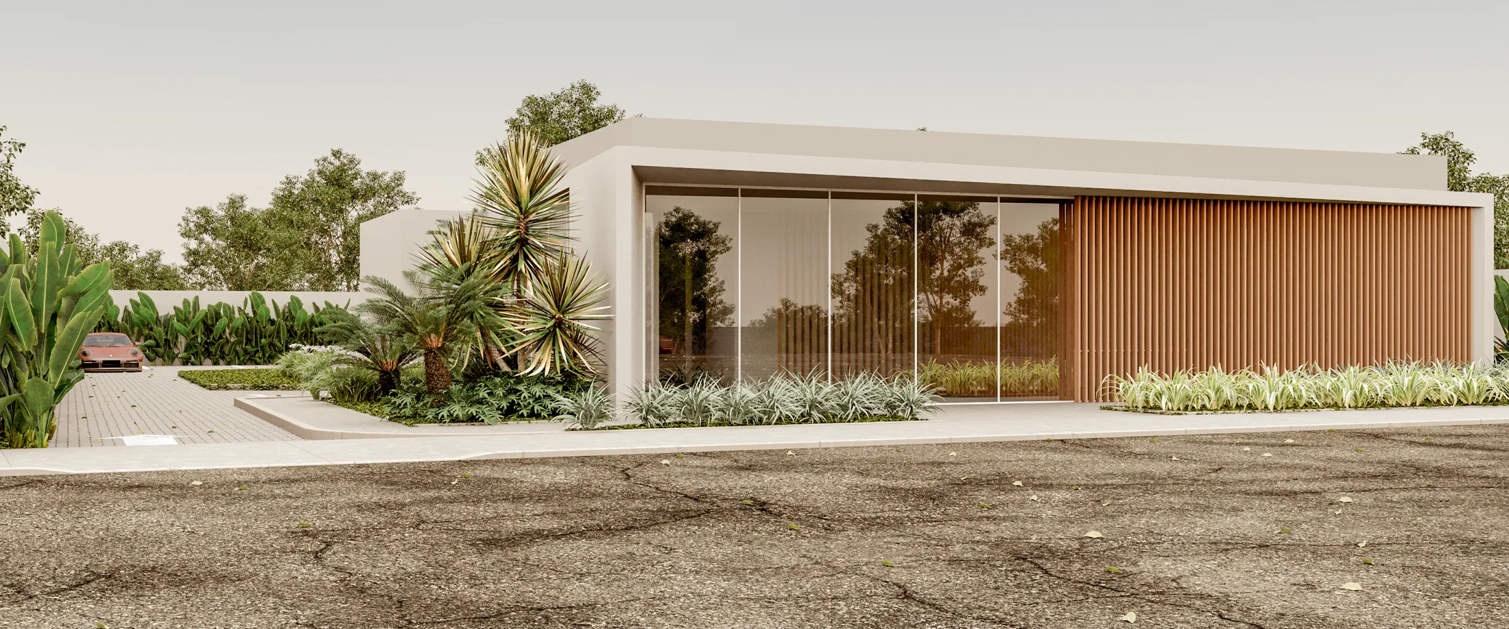 Angled view of a single-story house facade with floor-to-ceiling glass, wood slats and a tropical garden at the entrance
