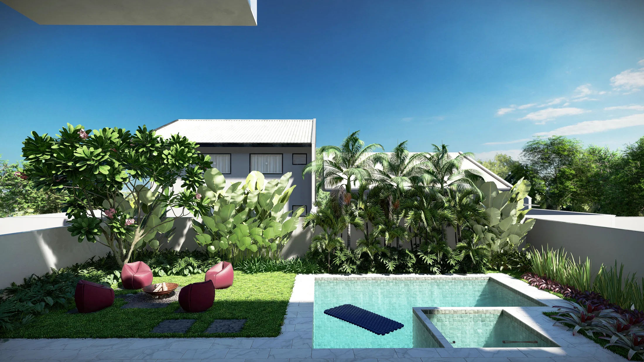 Backyard seating area with red armchairs around a fire pit, beneath a flowering tree and a pool alongside