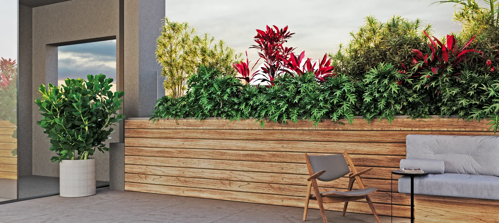 Terrace corner with a wooden planter brimming with foliage and bamboo, a fiddle-leaf fig in a white pot by the glass door and a teak chair.