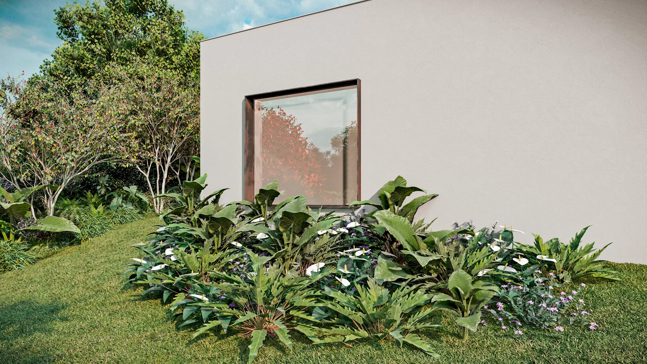 A planting bed against the house's pale wall, with broad leaves, white calla lilies and lilac flowers beneath a large window.