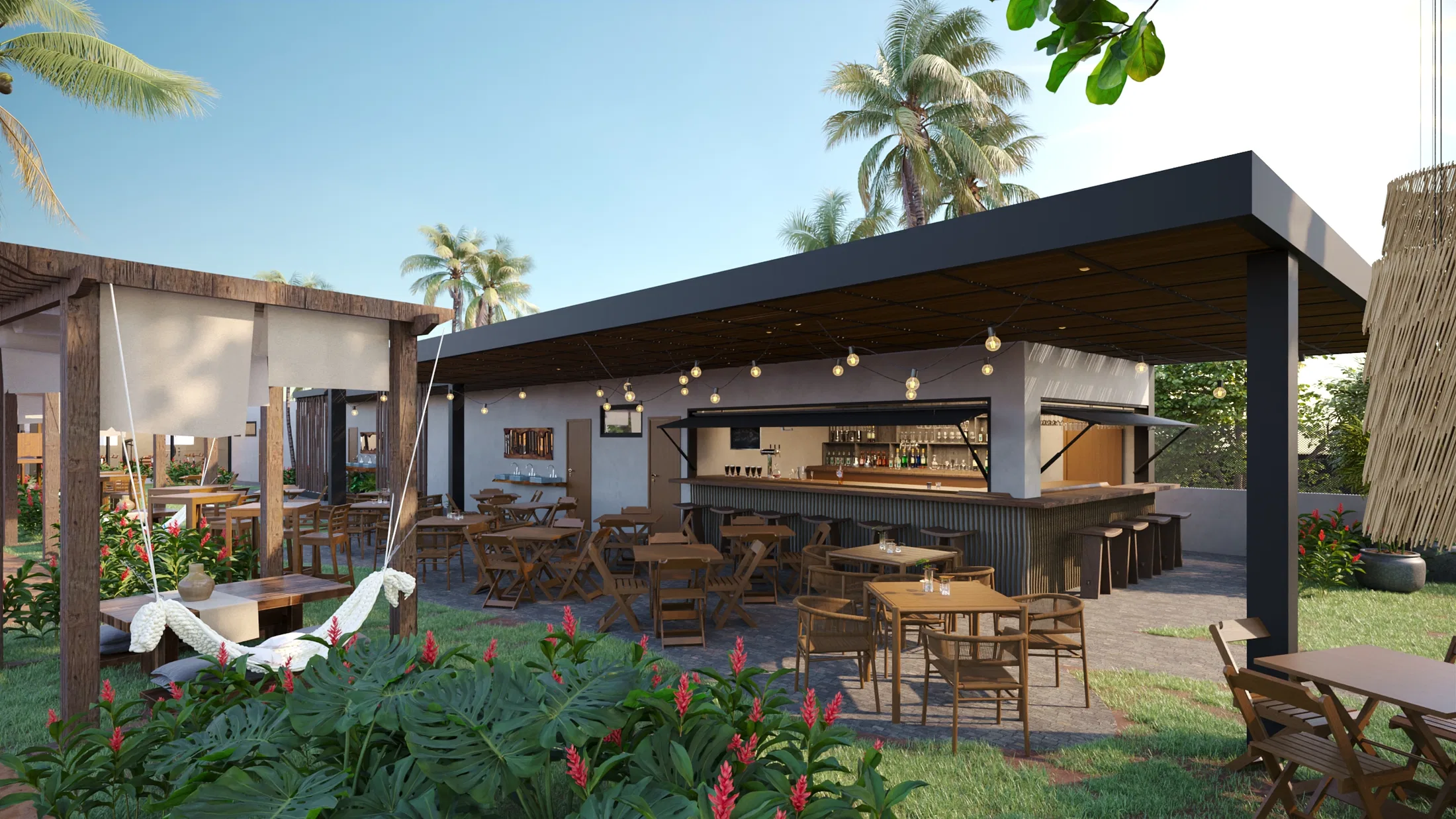 Open-air bar-lounge beneath a dark roof with festoon lights, a corrugated-metal counter with drinks, a hanging hammock and wood tables on the grass
